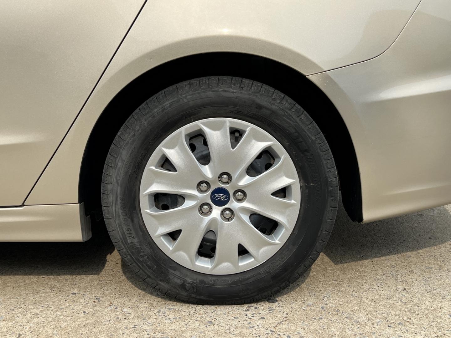 2019 GOLD /Tan Cloth Ford Fusion S (3FA6P0G79KR) with an 2.5L 4 Cyl. engine, Automatic transmission, located at 2990 Old Orchard Rd., Jackson, MO, 63755, 37.354214, -89.612106 - 2019 Ford Fusion S Only 57xxx miles Front Wheel Drive 2.5L 4 Cyl. Automatic Backup Camera Bluetooth Cruise Power Windows/Locks/Mirrors We have financing available and we accept trades! Fill out a credit application on our website or come by today! If you have any questions, give us a call - Photo#33