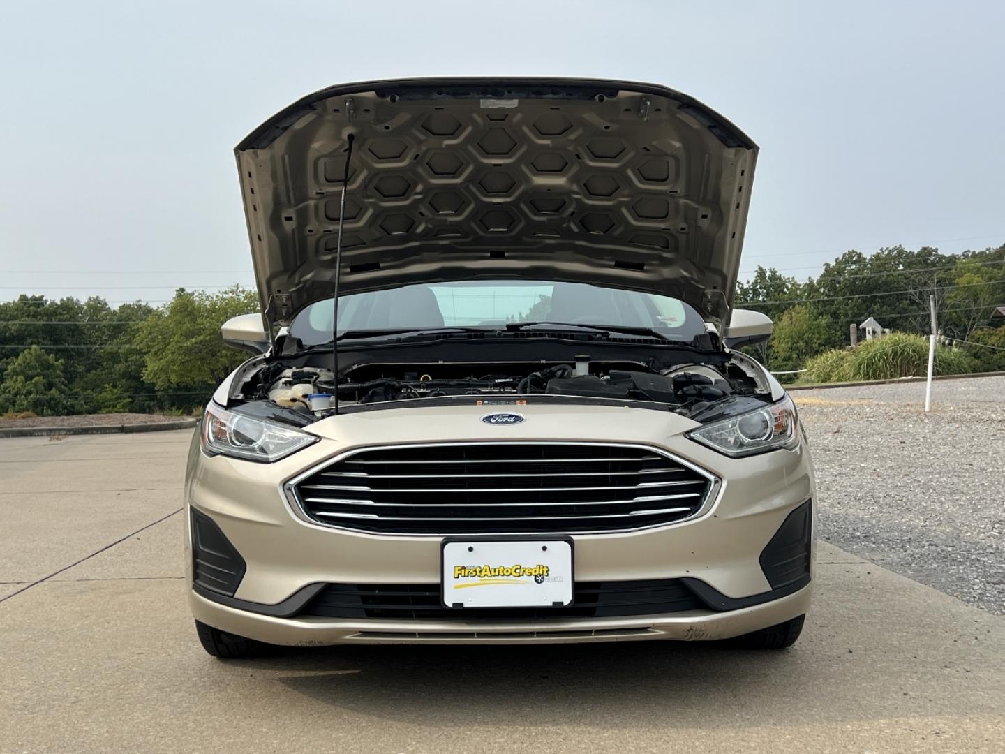 2019 GOLD /Tan Cloth Ford Fusion S (3FA6P0G79KR) with an 2.5L 4 Cyl. engine, Automatic transmission, located at 2990 Old Orchard Rd., Jackson, MO, 63755, 37.354214, -89.612106 - 2019 Ford Fusion S Only 57xxx miles Front Wheel Drive 2.5L 4 Cyl. Automatic Backup Camera Bluetooth Cruise Power Windows/Locks/Mirrors We have financing available and we accept trades! Fill out a credit application on our website or come by today! If you have any questions, give us a call - Photo#29