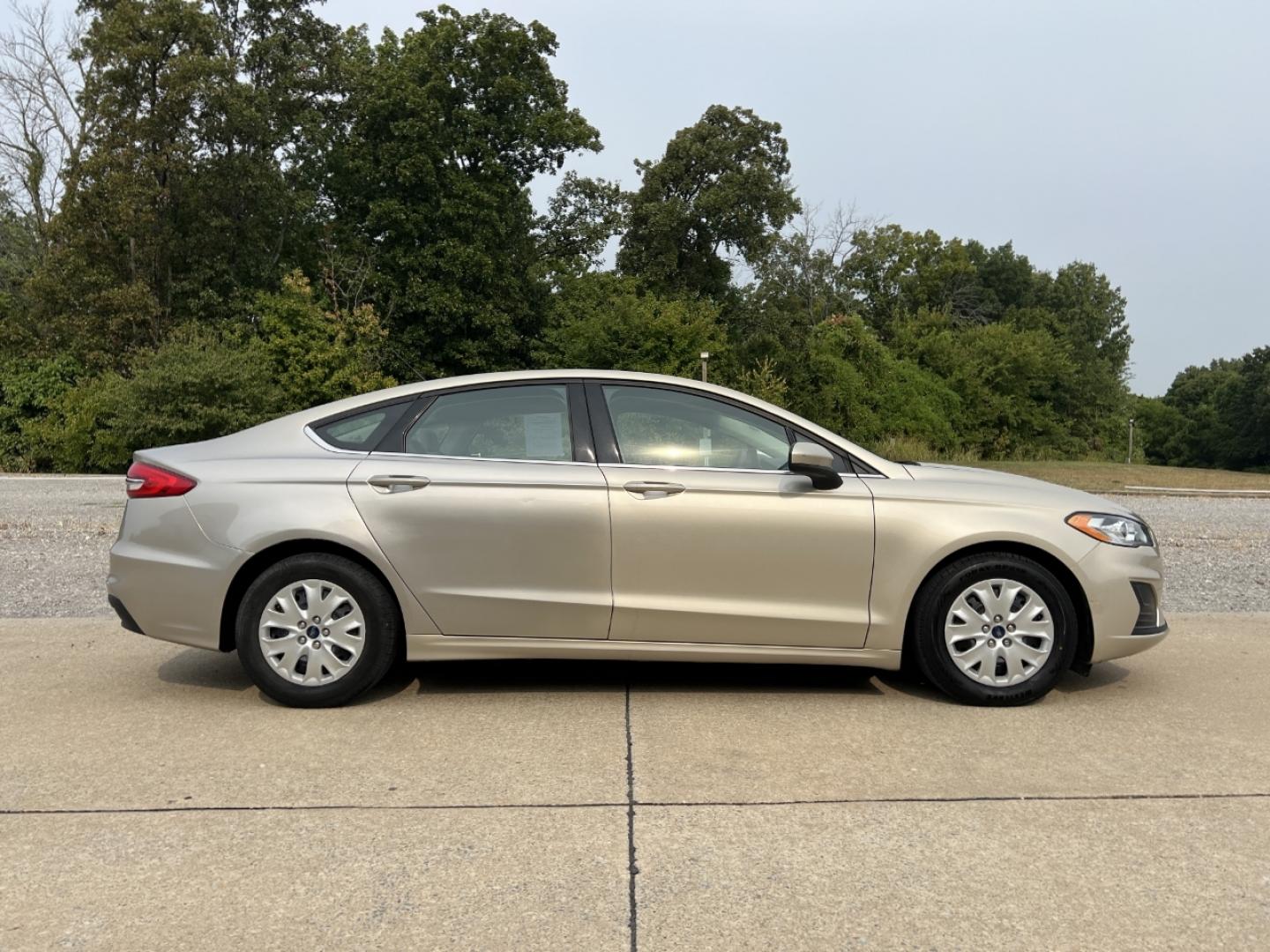 2019 GOLD /Tan Cloth Ford Fusion S (3FA6P0G79KR) with an 2.5L 4 Cyl. engine, Automatic transmission, located at 2990 Old Orchard Rd., Jackson, MO, 63755, 37.354214, -89.612106 - 2019 Ford Fusion S Only 57xxx miles Front Wheel Drive 2.5L 4 Cyl. Automatic Backup Camera Bluetooth Cruise Power Windows/Locks/Mirrors We have financing available and we accept trades! Fill out a credit application on our website or come by today! If you have any questions, give us a call - Photo#5