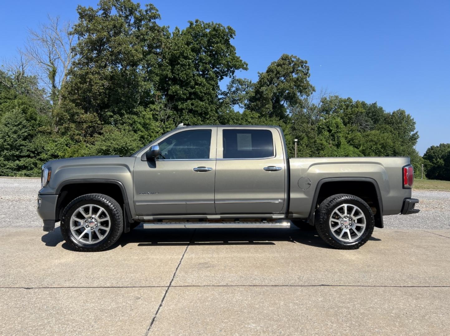 2018 GRAY /Black Leather GMC Sierra 1500 Denali Crew Cab Long Box 4WD (3GTU2PEC0JG) with an 5.3L V8 engine, Automatic transmission, located at 506 S. Kingshighway, Cape Girardeau, MO, 63703, (573) 235-5000, 37.294991, -89.553635 - 2018 GMC Sierra 1500 Denali 165xxx miles 4x4 5.3L V8 Automatic Leather New Tires Navigation Power/Heated/Cooled Seats Heated Steering Wheel Backup Camera Bluetooth Remote Start Cruise Power Windows/Locks/Mirrors We have financing available and we accept trades! Fill out a credit appli - Photo#8