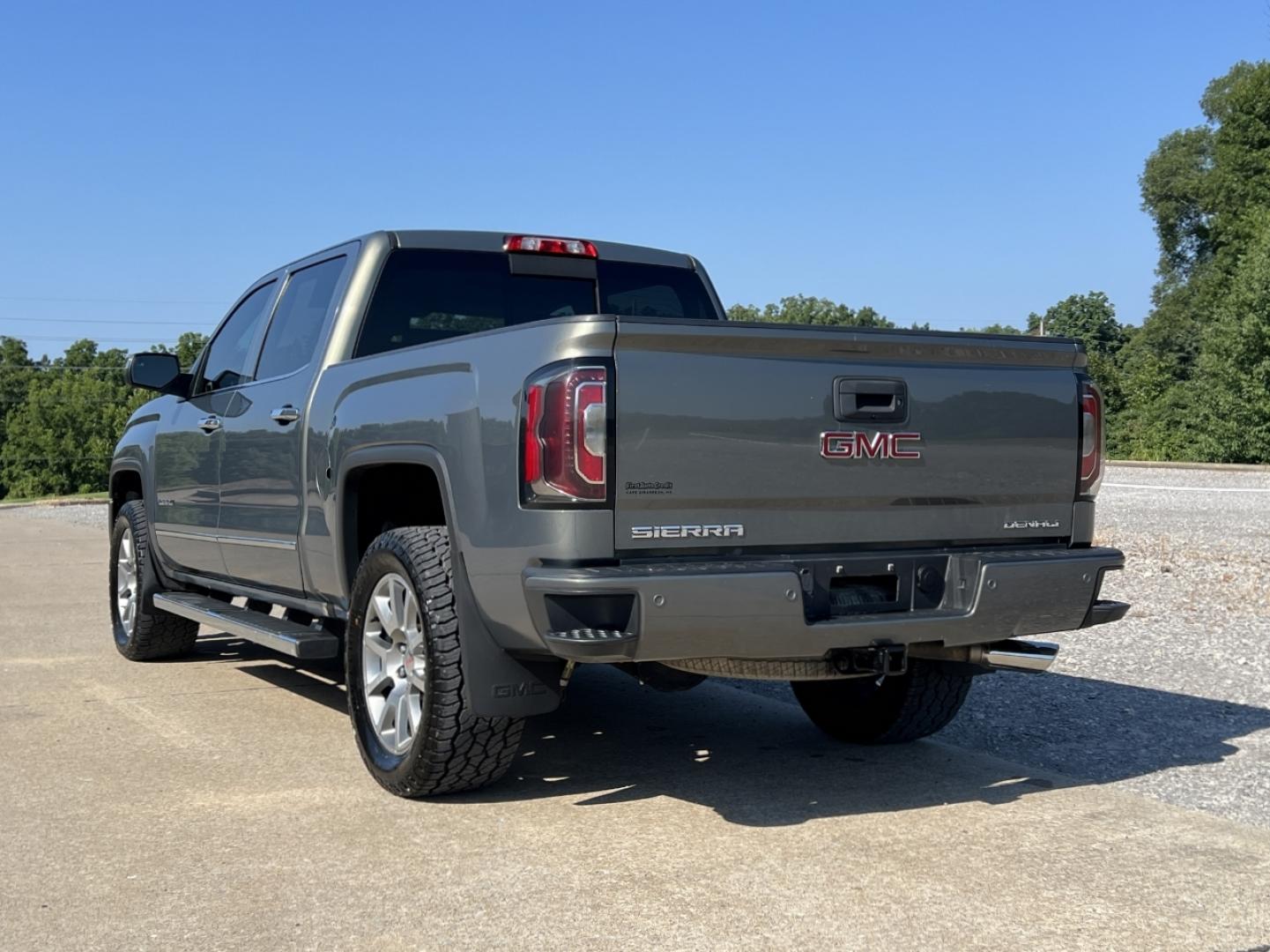 2018 GRAY /Black Leather GMC Sierra 1500 Denali Crew Cab Long Box 4WD (3GTU2PEC0JG) with an 5.3L V8 engine, Automatic transmission, located at 506 S. Kingshighway, Cape Girardeau, MO, 63703, (573) 235-5000, 37.294991, -89.553635 - 2018 GMC Sierra 1500 Denali 165xxx miles 4x4 5.3L V8 Automatic Leather New Tires Navigation Power/Heated/Cooled Seats Heated Steering Wheel Backup Camera Bluetooth Remote Start Cruise Power Windows/Locks/Mirrors We have financing available and we accept trades! Fill out a credit appli - Photo#11