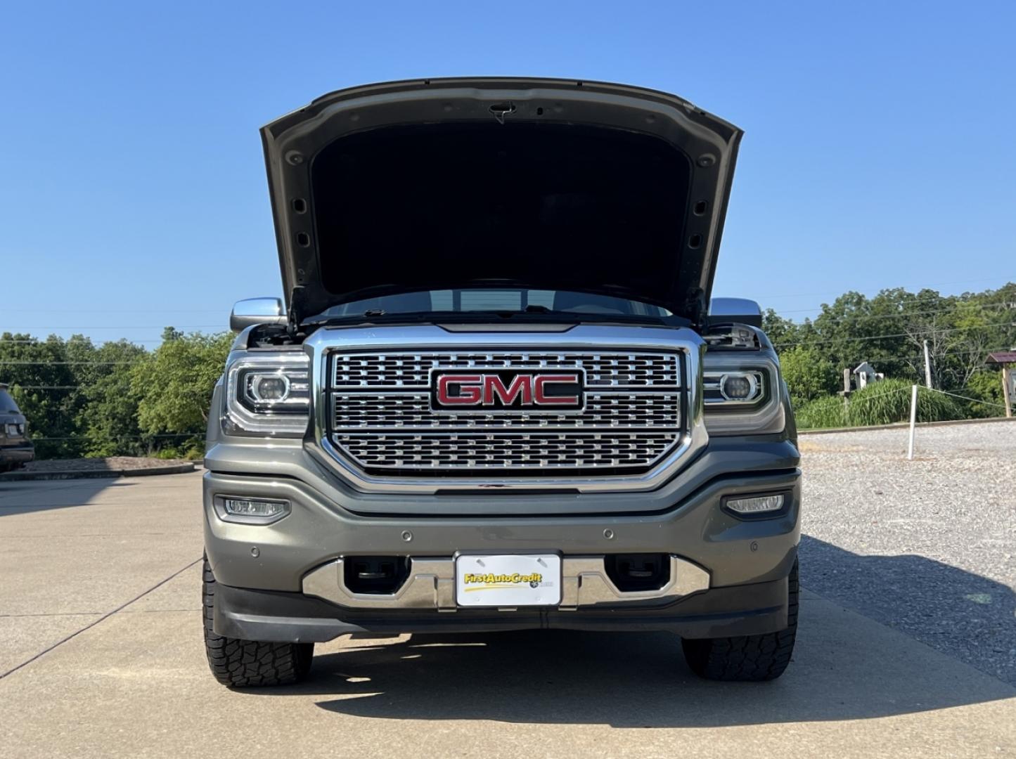 2018 GRAY /Black Leather GMC Sierra 1500 Denali Crew Cab Long Box 4WD (3GTU2PEC0JG) with an 5.3L V8 engine, Automatic transmission, located at 506 S. Kingshighway, Cape Girardeau, MO, 63703, (573) 235-5000, 37.294991, -89.553635 - 2018 GMC Sierra 1500 Denali 165xxx miles 4x4 5.3L V8 Automatic Leather New Tires Navigation Power/Heated/Cooled Seats Heated Steering Wheel Backup Camera Bluetooth Remote Start Cruise Power Windows/Locks/Mirrors We have financing available and we accept trades! Fill out a credit appli - Photo#30
