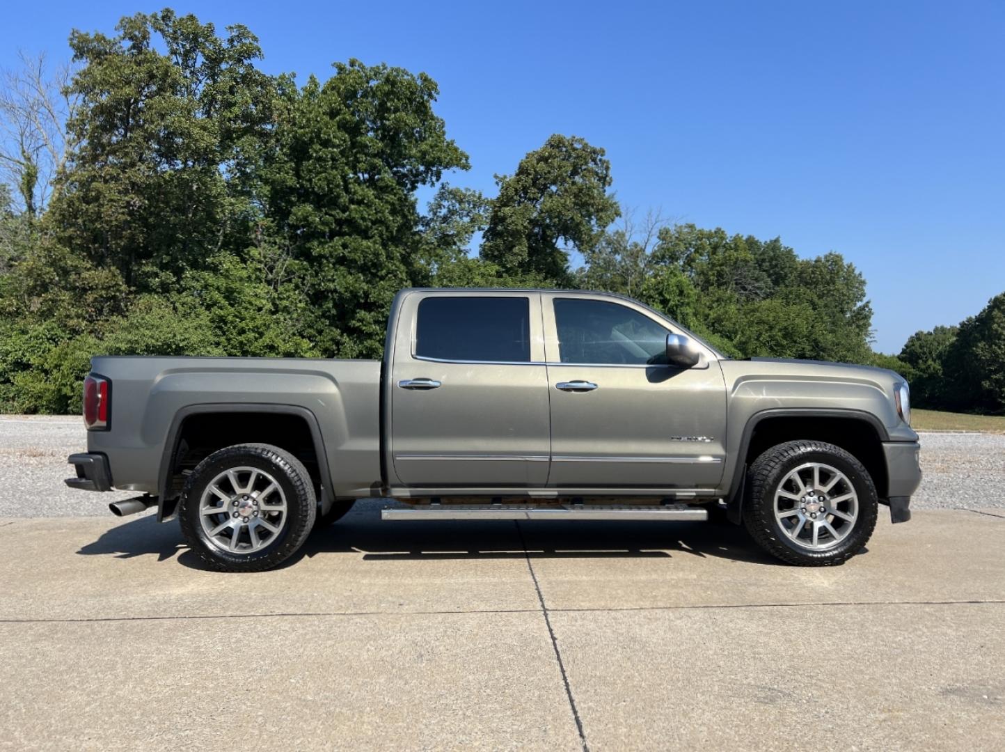 2018 GRAY /Black Leather GMC Sierra 1500 Denali Crew Cab Long Box 4WD (3GTU2PEC0JG) with an 5.3L V8 engine, Automatic transmission, located at 506 S. Kingshighway, Cape Girardeau, MO, 63703, (573) 235-5000, 37.294991, -89.553635 - 2018 GMC Sierra 1500 Denali 165xxx miles 4x4 5.3L V8 Automatic Leather New Tires Navigation Power/Heated/Cooled Seats Heated Steering Wheel Backup Camera Bluetooth Remote Start Cruise Power Windows/Locks/Mirrors We have financing available and we accept trades! Fill out a credit appli - Photo#9