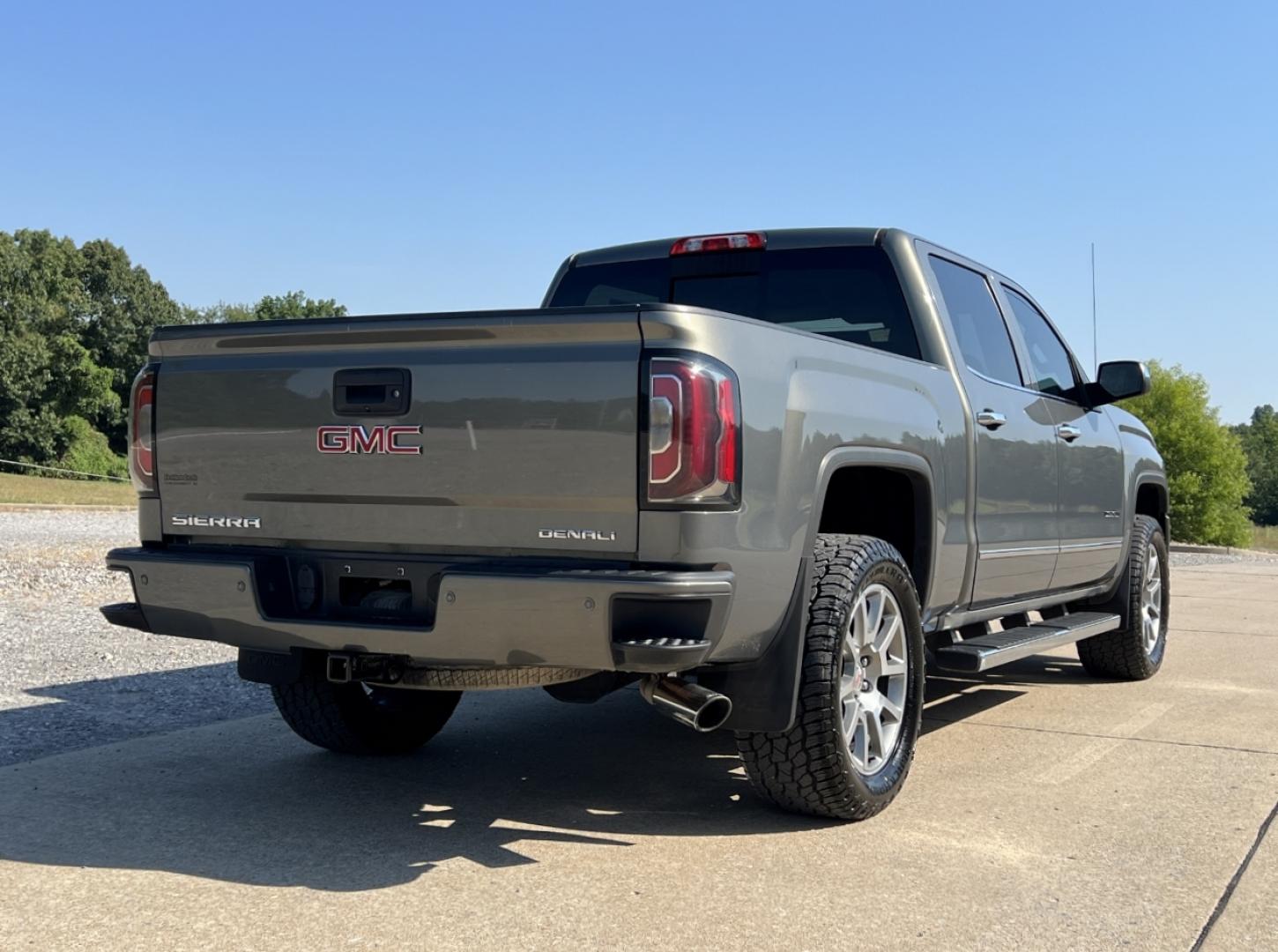 2018 GRAY /Black Leather GMC Sierra 1500 Denali Crew Cab Long Box 4WD (3GTU2PEC0JG) with an 5.3L V8 engine, Automatic transmission, located at 506 S. Kingshighway, Cape Girardeau, MO, 63703, (573) 235-5000, 37.294991, -89.553635 - 2018 GMC Sierra 1500 Denali 165xxx miles 4x4 5.3L V8 Automatic Leather New Tires Navigation Power/Heated/Cooled Seats Heated Steering Wheel Backup Camera Bluetooth Remote Start Cruise Power Windows/Locks/Mirrors We have financing available and we accept trades! Fill out a credit appli - Photo#10