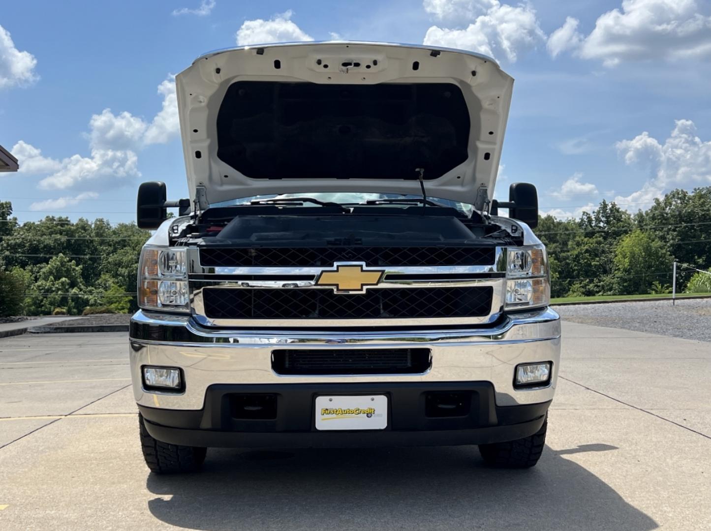 2013 WHITE /Black Cloth Chevrolet Silverado 2500HD LT Ext. Cab 4WD (1GC2KXCGXDZ) with an 6.0L V8 engine, Automatic transmission, located at 2990 Old Orchard Rd., Jackson, MO, 63755, 37.354214, -89.612106 - 2013 Chevrolet Silverado 2500HD LT Only 44xxx miles 4x4 6.0L V8 Automatic New Tires Power Driver Seat Cruise Power Windows/Locks/Mirrors We have financing available and we accept trades! Fill out a credit application on our website or come by today! If you have any questions, give us a cal - Photo#31