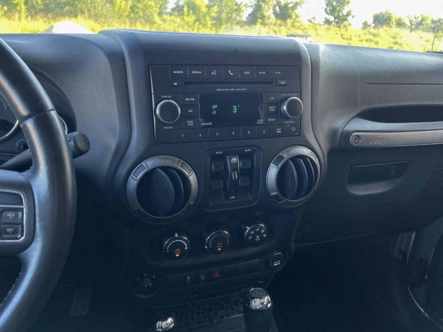 2015 GRAY /Black Cloth Jeep Wrangler Unlimited Sport 4WD (1C4BJWDG0FL) with an 3.6L V6 engine, Automatic transmission, located at 2990 Old Orchard Rd., Jackson, MO, 63755, 37.354214, -89.612106 - We have financing available and we accept trades! Fill out a credit application on our website or come by today! If you have any questions, give us a call at (573) 204-7777 or visit our website at firstautocredit.com. - Photo#3