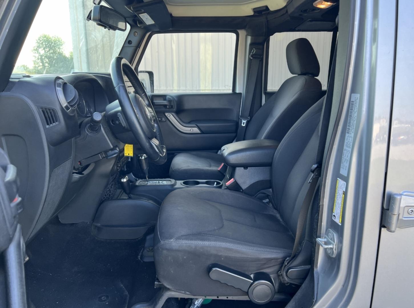 2015 GRAY /Black Cloth Jeep Wrangler Unlimited Sport 4WD (1C4BJWDG0FL) with an 3.6L V6 engine, Automatic transmission, located at 2990 Old Orchard Rd., Jackson, MO, 63755, 37.354214, -89.612106 - We have financing available and we accept trades! Fill out a credit application on our website or come by today! If you have any questions, give us a call at (573) 204-7777 or visit our website at firstautocredit.com. - Photo#4