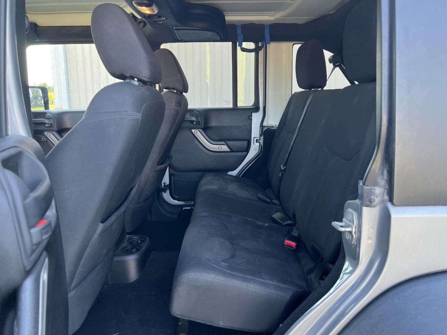 2015 GRAY /Black Cloth Jeep Wrangler Unlimited Sport 4WD (1C4BJWDG0FL) with an 3.6L V6 engine, Automatic transmission, located at 2990 Old Orchard Rd., Jackson, MO, 63755, 37.354214, -89.612106 - We have financing available and we accept trades! Fill out a credit application on our website or come by today! If you have any questions, give us a call at (573) 204-7777 or visit our website at firstautocredit.com. - Photo#5