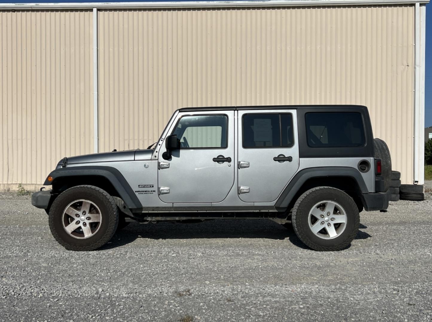 2015 GRAY /Black Cloth Jeep Wrangler Unlimited Sport 4WD (1C4BJWDG0FL) with an 3.6L V6 engine, Automatic transmission, located at 2990 Old Orchard Rd., Jackson, MO, 63755, 37.354214, -89.612106 - We have financing available and we accept trades! Fill out a credit application on our website or come by today! If you have any questions, give us a call at (573) 204-7777 or visit our website at firstautocredit.com. - Photo#6
