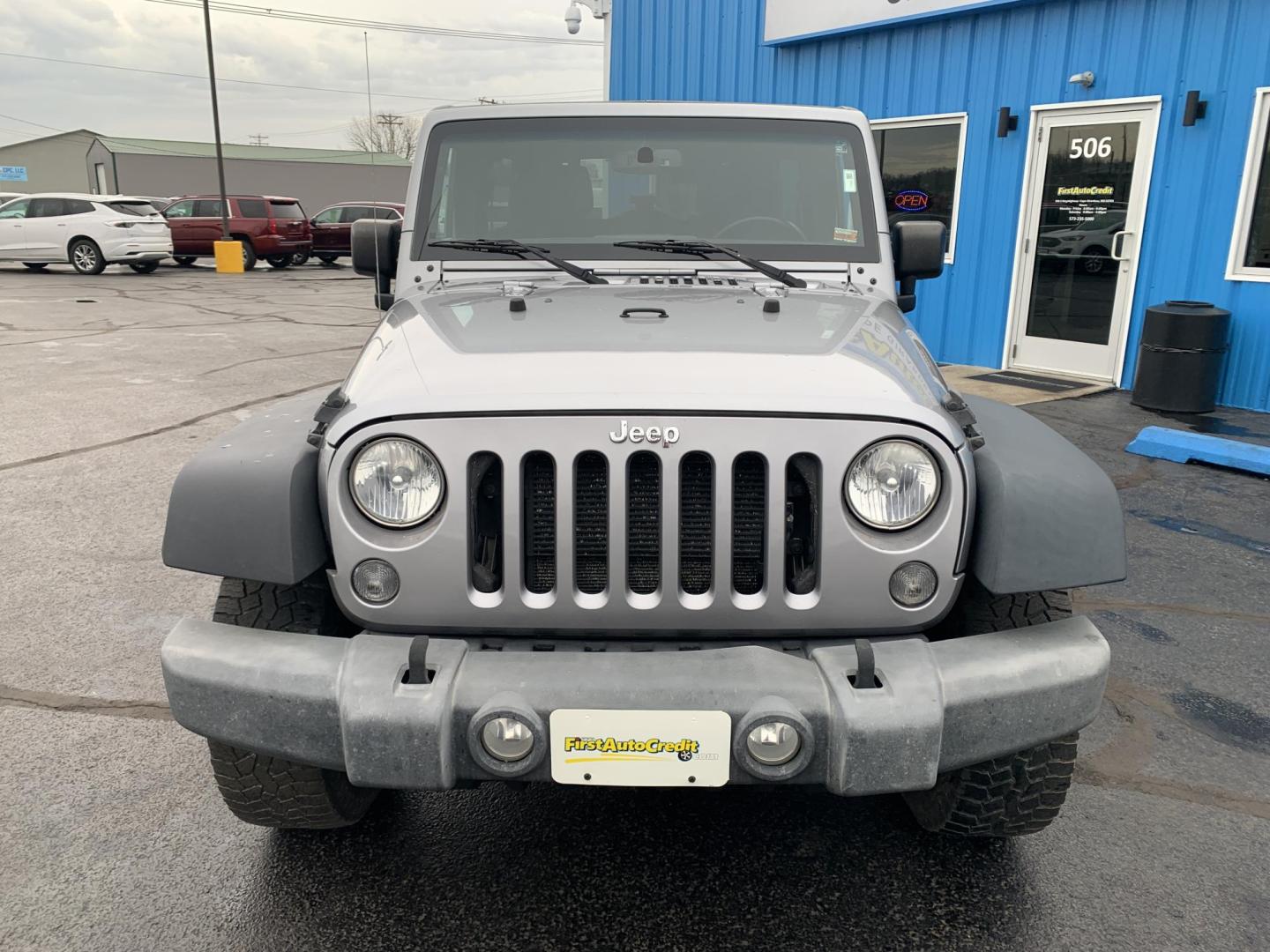 2015 GRAY /Black Cloth Jeep Wrangler Unlimited Sport 4WD (1C4BJWDG0FL) with an 3.6L V6 engine, Automatic transmission, located at 506 S. Kingshighway, Cape Girardeau, MO, 63703, (573) 235-5000, 37.294991, -89.553635 - 2015 Jeep Wrangler Unlimited Sport 205xxx miles 4x4 3.6L V6 Automatic Cruise Power Windows/Locks/Mirrors We have financing available and we accept trades! Fill out a credit application on our website or come by today! If you have any questions, give us a call at (573) 235-5000 or visit our - Photo#1