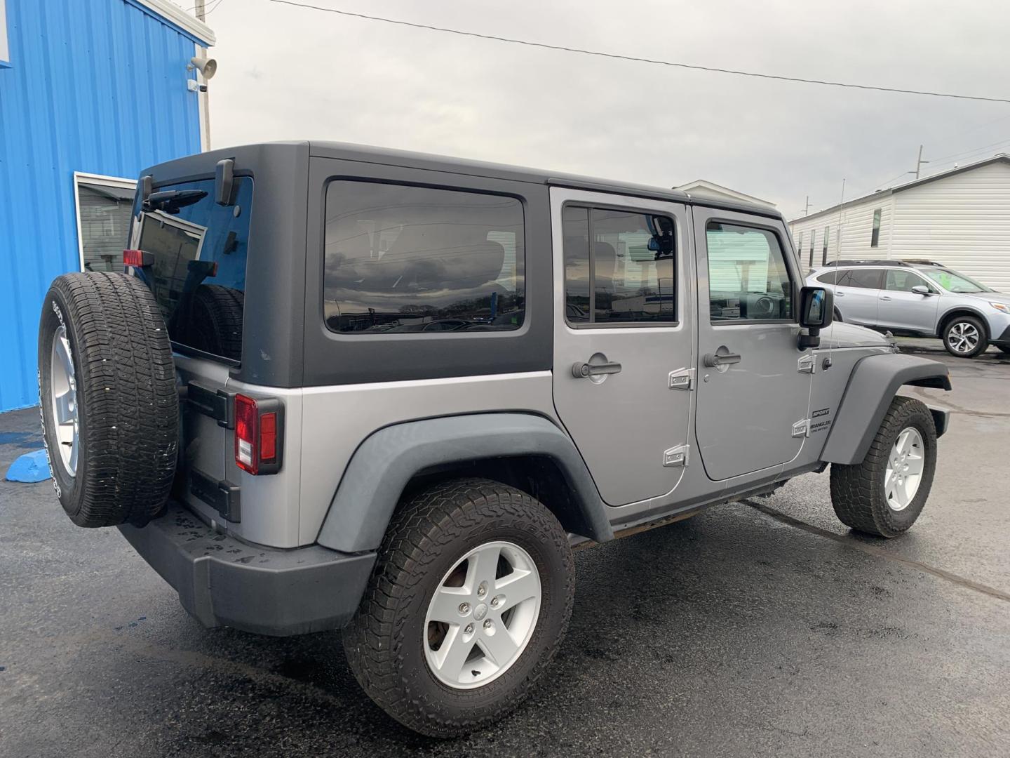 2015 GRAY /Black Cloth Jeep Wrangler Unlimited Sport 4WD (1C4BJWDG0FL) with an 3.6L V6 engine, Automatic transmission, located at 506 S. Kingshighway, Cape Girardeau, MO, 63703, (573) 235-5000, 37.294991, -89.553635 - 2015 Jeep Wrangler Unlimited Sport 205xxx miles 4x4 3.6L V6 Automatic Cruise Power Windows/Locks/Mirrors We have financing available and we accept trades! Fill out a credit application on our website or come by today! If you have any questions, give us a call at (573) 235-5000 or visit our - Photo#7