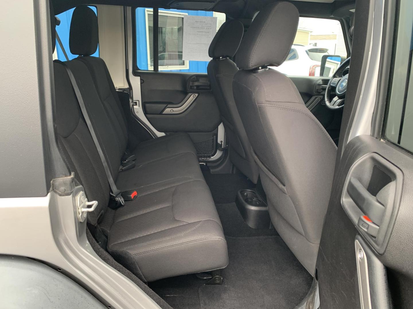 2015 GRAY /Black Cloth Jeep Wrangler Unlimited Sport 4WD (1C4BJWDG0FL) with an 3.6L V6 engine, Automatic transmission, located at 506 S. Kingshighway, Cape Girardeau, MO, 63703, (573) 235-5000, 37.294991, -89.553635 - 2015 Jeep Wrangler Unlimited Sport 205xxx miles 4x4 3.6L V6 Automatic Cruise Power Windows/Locks/Mirrors We have financing available and we accept trades! Fill out a credit application on our website or come by today! If you have any questions, give us a call at (573) 235-5000 or visit our - Photo#12