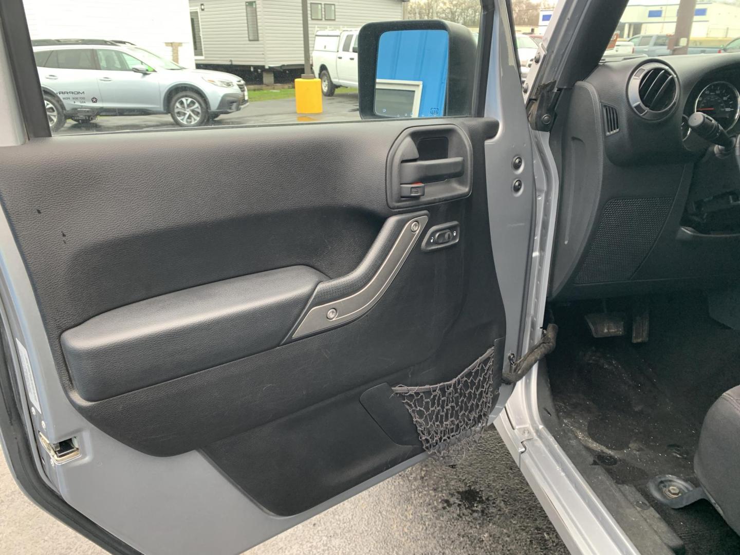 2015 GRAY /Black Cloth Jeep Wrangler Unlimited Sport 4WD (1C4BJWDG0FL) with an 3.6L V6 engine, Automatic transmission, located at 506 S. Kingshighway, Cape Girardeau, MO, 63703, (573) 235-5000, 37.294991, -89.553635 - 2015 Jeep Wrangler Unlimited Sport 205xxx miles 4x4 3.6L V6 Automatic Cruise Power Windows/Locks/Mirrors We have financing available and we accept trades! Fill out a credit application on our website or come by today! If you have any questions, give us a call at (573) 235-5000 or visit our - Photo#15