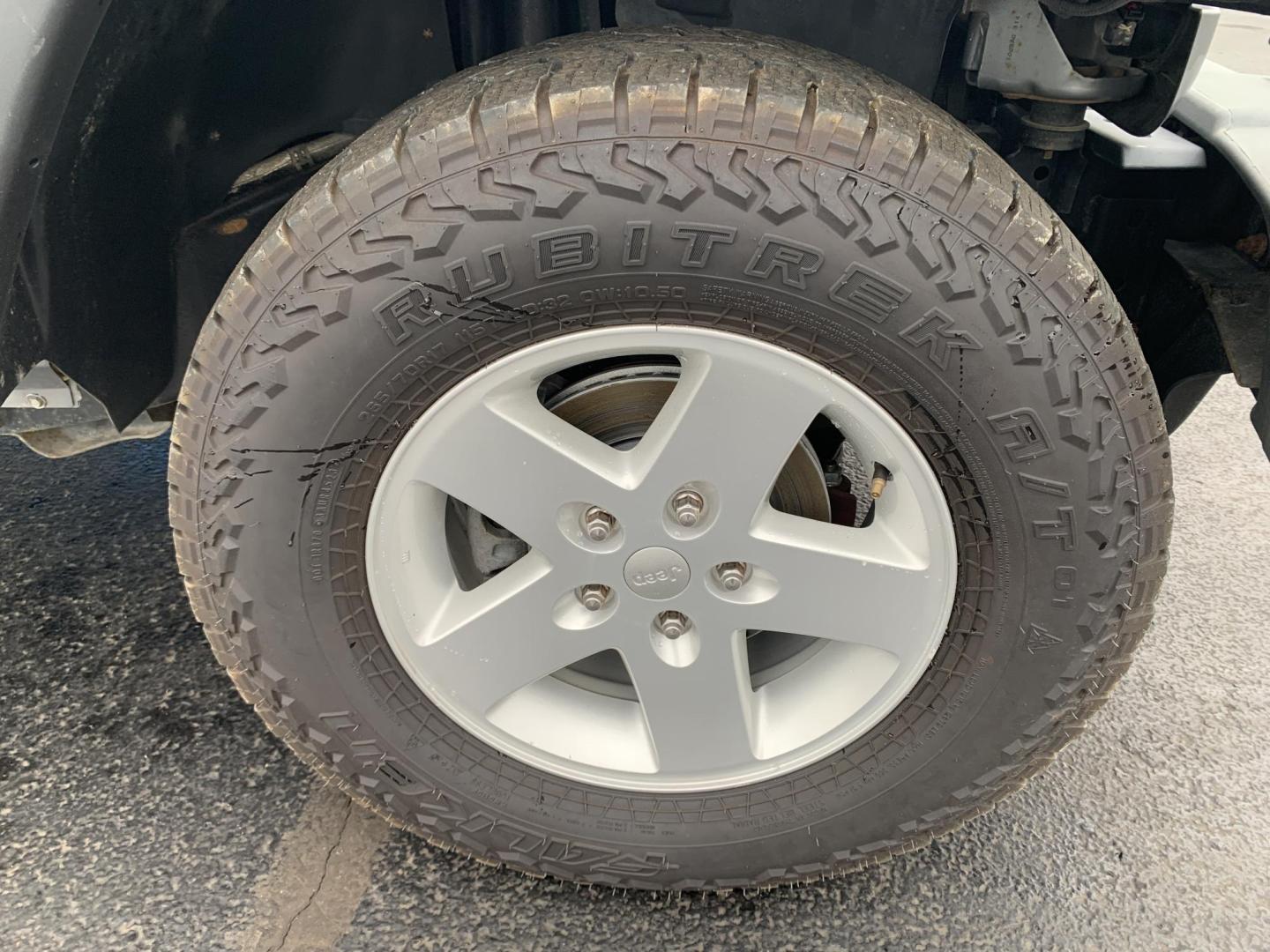 2015 GRAY /Black Cloth Jeep Wrangler Unlimited Sport 4WD (1C4BJWDG0FL) with an 3.6L V6 engine, Automatic transmission, located at 506 S. Kingshighway, Cape Girardeau, MO, 63703, (573) 235-5000, 37.294991, -89.553635 - 2015 Jeep Wrangler Unlimited Sport 205xxx miles 4x4 3.6L V6 Automatic Cruise Power Windows/Locks/Mirrors We have financing available and we accept trades! Fill out a credit application on our website or come by today! If you have any questions, give us a call at (573) 235-5000 or visit our - Photo#27