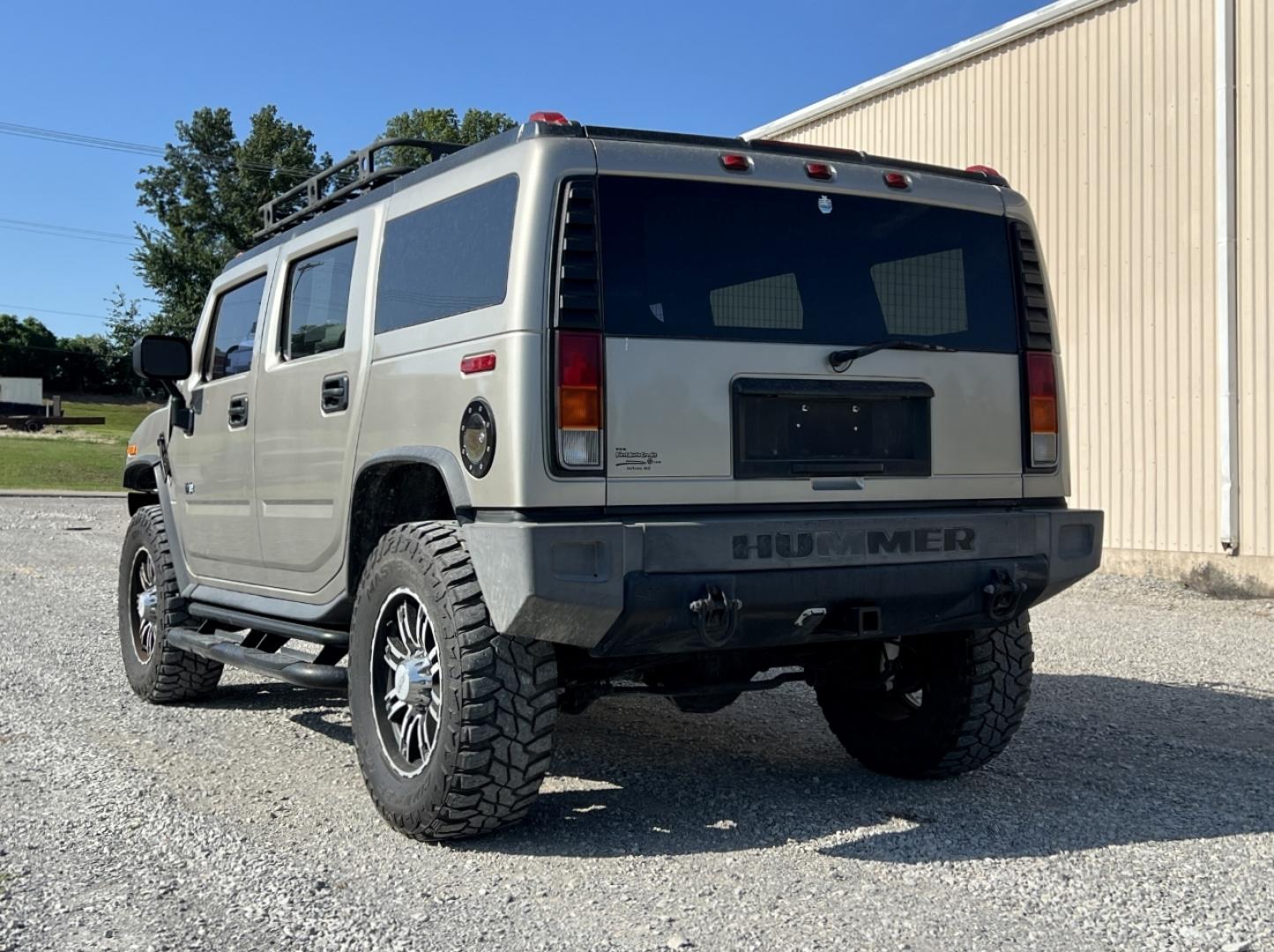 2004 TAN /Tan Hummer H2 Sport Utility (5GRGN23U84H) with an 6.0L V8 engine, Automatic transmission, located at 2990 Old Orchard Rd., Jackson, MO, 63755, 37.354214, -89.612106 - We have financing available and we accept trades! Fill out a credit application on our website or come by today! If you have any questions, give us a call at (573) 204-7777 or visit our website at firstautocredit.com. - Photo#7