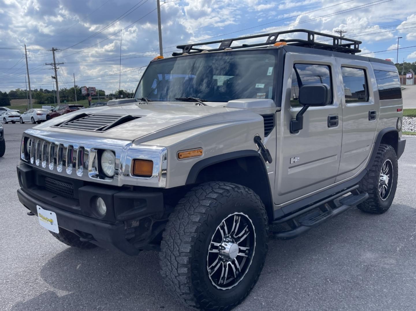 2004 TAN /Tan Hummer H2 Sport Utility (5GRGN23U84H) with an 6.0L V8 engine, Automatic transmission, located at 2990 Old Orchard Rd., Jackson, MO, 63755, 37.354214, -89.612106 - We have financing available and we accept trades! Fill out a credit application on our website or come by today! If you have any questions, give us a call at (573) 204-7777 or visit our website at firstautocredit.com. - Photo#4