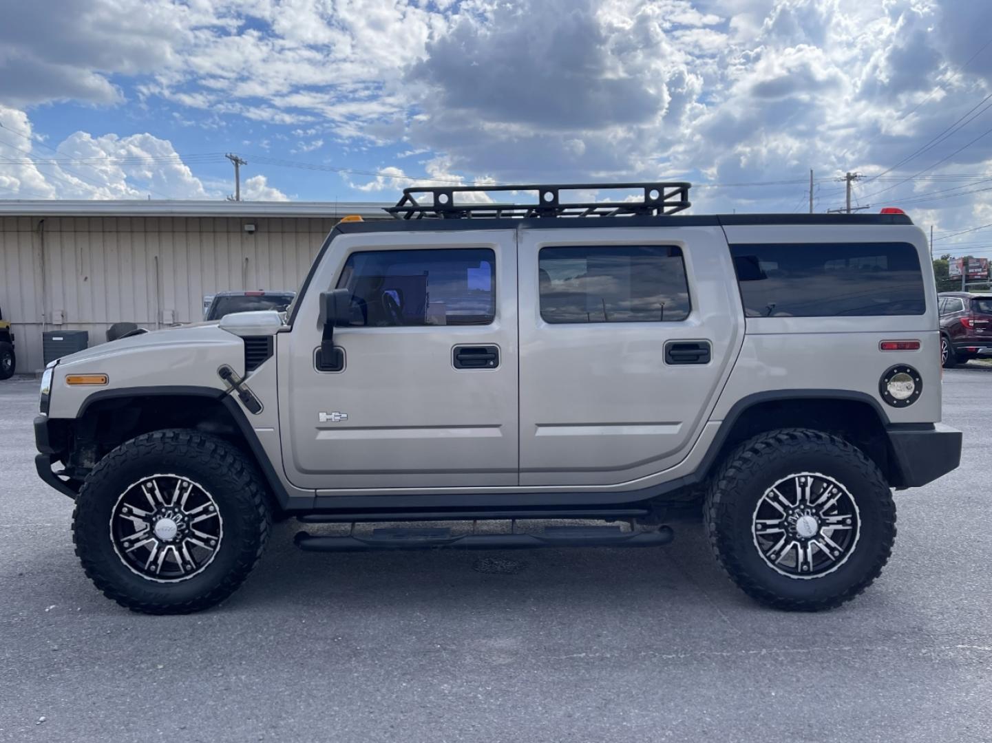 2004 TAN /Tan Hummer H2 Sport Utility (5GRGN23U84H) with an 6.0L V8 engine, Automatic transmission, located at 2990 Old Orchard Rd., Jackson, MO, 63755, 37.354214, -89.612106 - We have financing available and we accept trades! Fill out a credit application on our website or come by today! If you have any questions, give us a call at (573) 204-7777 or visit our website at firstautocredit.com. - Photo#5