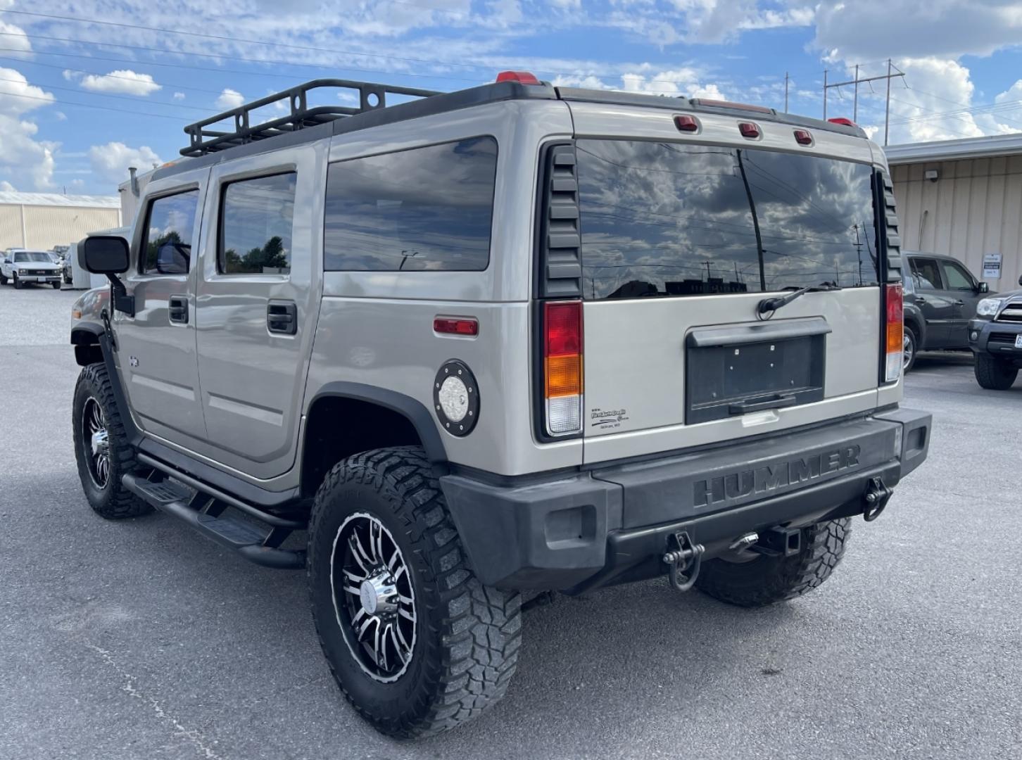 2004 TAN /Tan Hummer H2 Sport Utility (5GRGN23U84H) with an 6.0L V8 engine, Automatic transmission, located at 2990 Old Orchard Rd., Jackson, MO, 63755, 37.354214, -89.612106 - We have financing available and we accept trades! Fill out a credit application on our website or come by today! If you have any questions, give us a call at (573) 204-7777 or visit our website at firstautocredit.com. - Photo#8