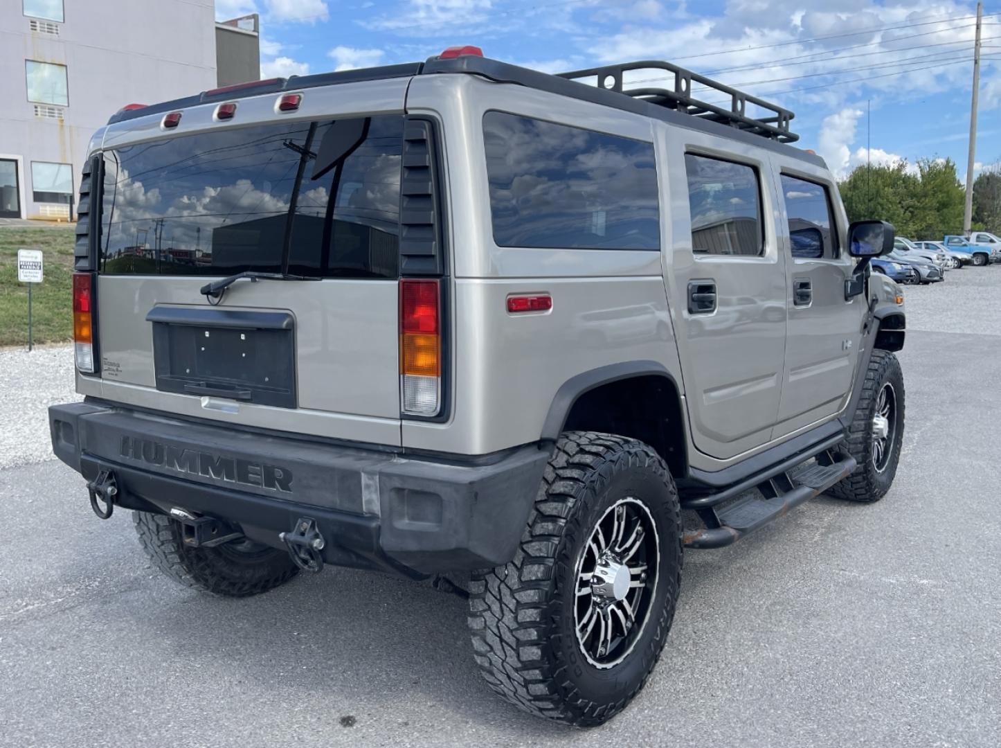 2004 TAN /Tan Hummer H2 Sport Utility (5GRGN23U84H) with an 6.0L V8 engine, Automatic transmission, located at 2990 Old Orchard Rd., Jackson, MO, 63755, 37.354214, -89.612106 - We have financing available and we accept trades! Fill out a credit application on our website or come by today! If you have any questions, give us a call at (573) 204-7777 or visit our website at firstautocredit.com. - Photo#7