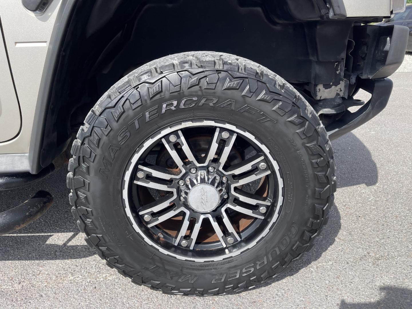 2004 TAN /Tan Hummer H2 Sport Utility (5GRGN23U84H) with an 6.0L V8 engine, Automatic transmission, located at 2990 Old Orchard Rd., Jackson, MO, 63755, 37.354214, -89.612106 - We have financing available and we accept trades! Fill out a credit application on our website or come by today! If you have any questions, give us a call at (573) 204-7777 or visit our website at firstautocredit.com. - Photo#29