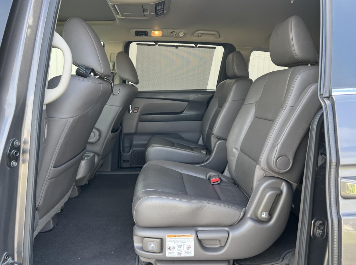 2016 GRAY /Gray Leather Honda Odyssey EX-L (5FNRL5H61GB) with an 3.5L V6 engine, Automatic transmission, located at 2990 Old Orchard Rd., Jackson, MO, 63755, 37.354214, -89.612106 - We have financing available and we accept trades! Fill out a credit application on our website or come by today! If you have any questions, give us a call at (573) 204-7777 or visit our website at firstautocredit.com. - Photo#8