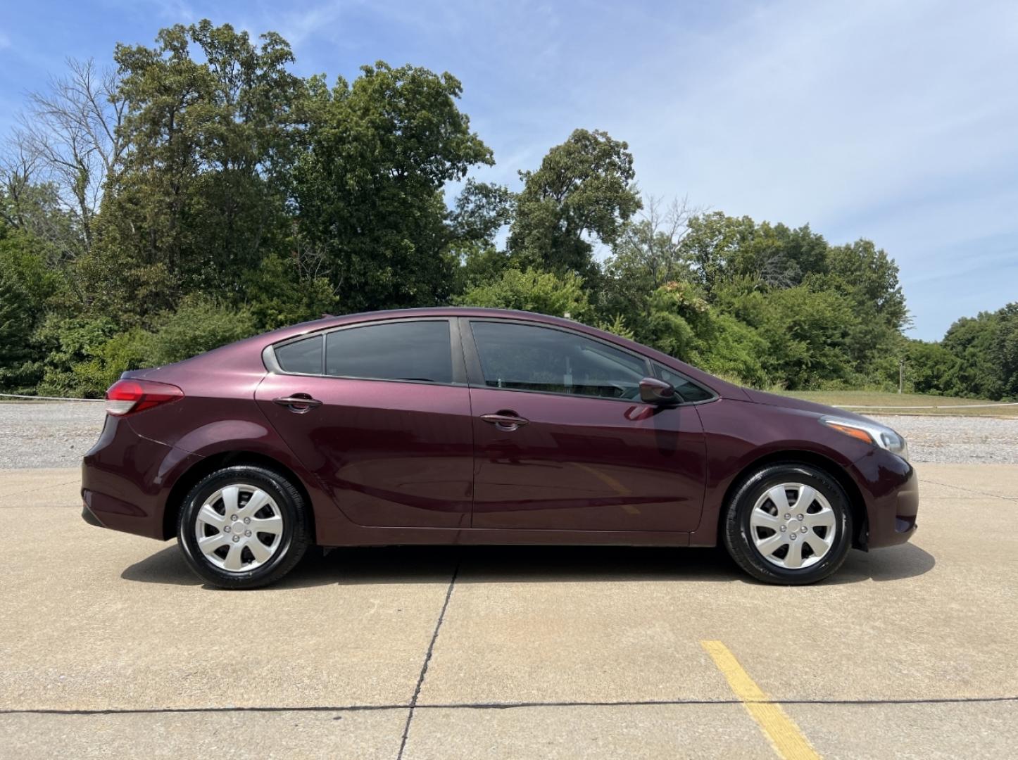 2018 BURGUNDY /Black Cloth Kia Forte LX (3KPFK4A75JE) with an 2.0L 4 Cyl. engine, Automatic transmission, located at 506 S. Kingshighway, Cape Girardeau, MO, 63703, (573) 235-5000, 37.294991, -89.553635 - 2018 Kia Forte LX 111xxx miles Front Wheel Drive 2.0L 4 Cyl. Automatic Backup Camera Bluetooth Cruise Power Windows/Locks/Mirrors We have financing available and we accept trades! Fill out a credit application on our website or come by today! If you have any questions, give us a call at (5 - Photo#5