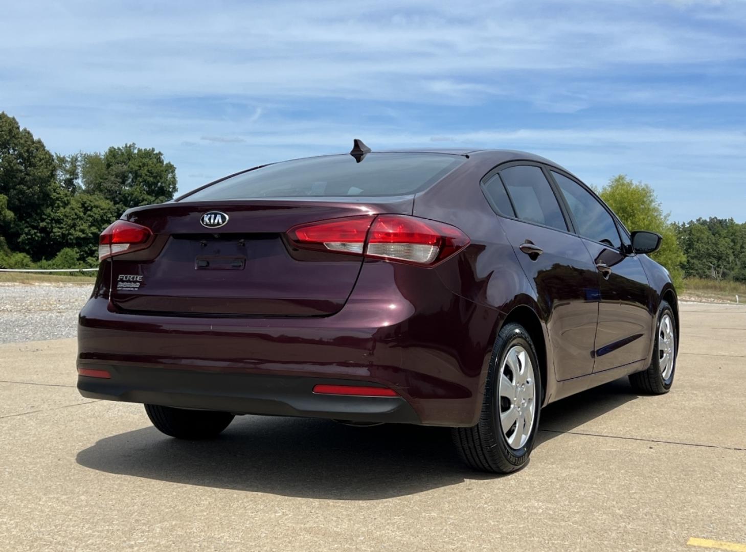 2018 BURGUNDY /Black Cloth Kia Forte LX (3KPFK4A75JE) with an 2.0L 4 Cyl. engine, Automatic transmission, located at 506 S. Kingshighway, Cape Girardeau, MO, 63703, (573) 235-5000, 37.294991, -89.553635 - 2018 Kia Forte LX 111xxx miles Front Wheel Drive 2.0L 4 Cyl. Automatic Backup Camera Bluetooth Cruise Power Windows/Locks/Mirrors We have financing available and we accept trades! Fill out a credit application on our website or come by today! If you have any questions, give us a call at (5 - Photo#6