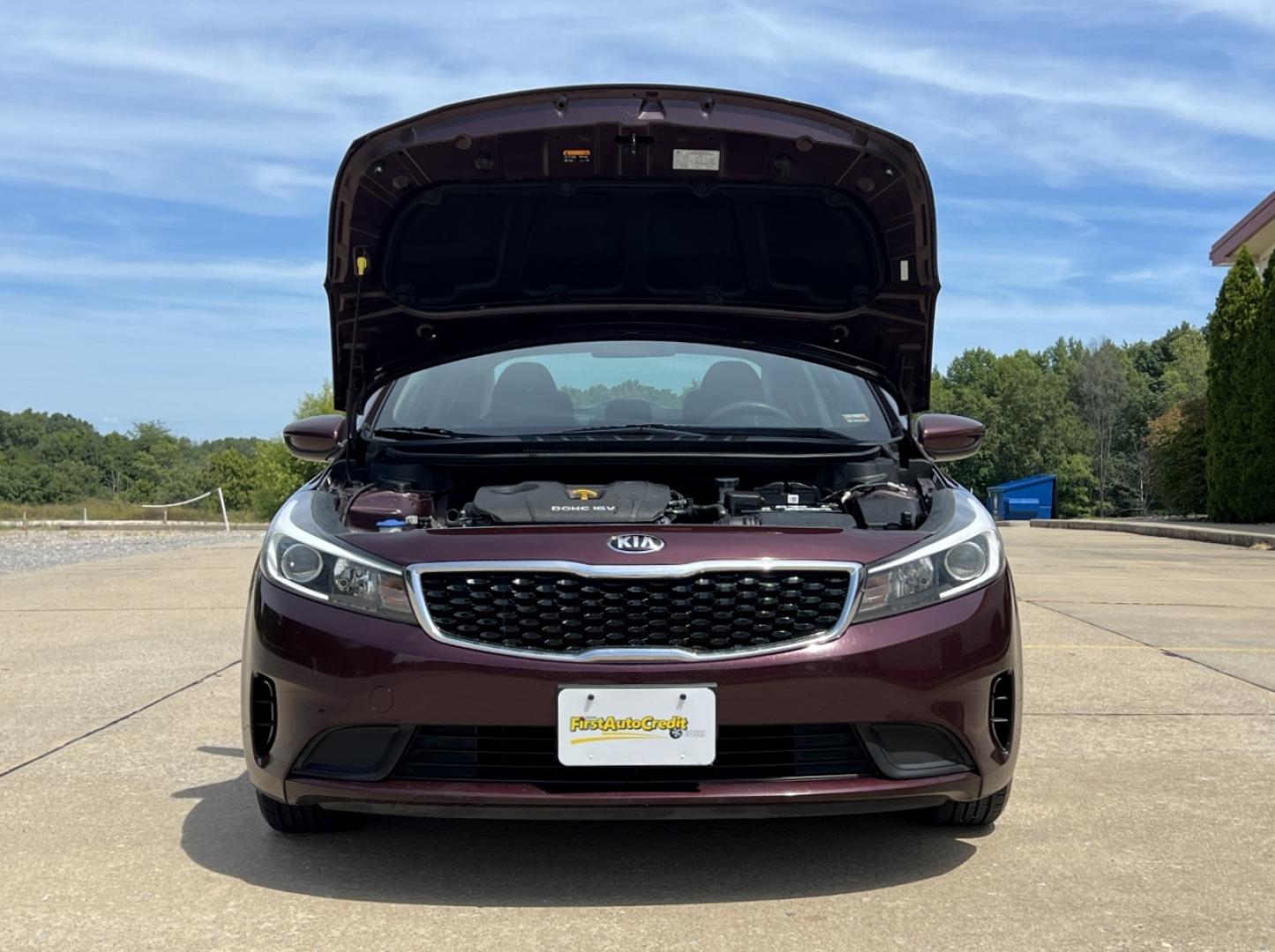 2018 BURGUNDY /Black Cloth Kia Forte LX (3KPFK4A75JE) with an 2.0L 4 Cyl. engine, Automatic transmission, located at 506 S. Kingshighway, Cape Girardeau, MO, 63703, (573) 235-5000, 37.294991, -89.553635 - 2018 Kia Forte LX 111xxx miles Front Wheel Drive 2.0L 4 Cyl. Automatic Backup Camera Bluetooth Cruise Power Windows/Locks/Mirrors We have financing available and we accept trades! Fill out a credit application on our website or come by today! If you have any questions, give us a call at (5 - Photo#28