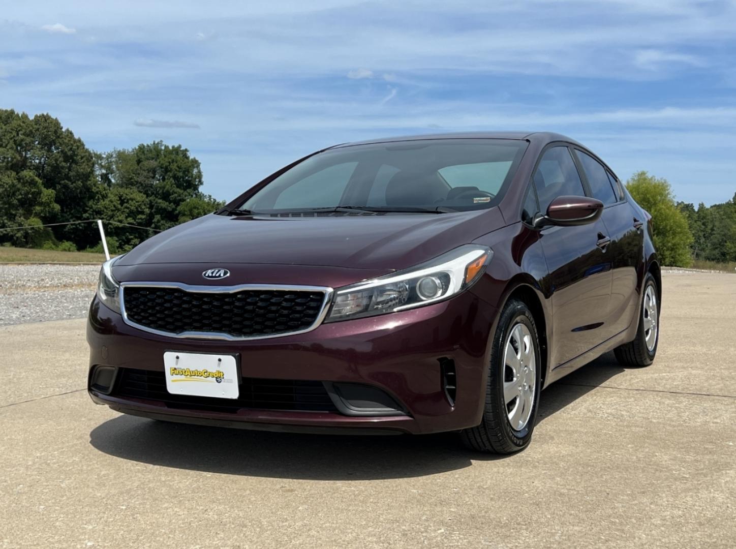 2018 BURGUNDY /Black Cloth Kia Forte LX (3KPFK4A75JE) with an 2.0L 4 Cyl. engine, Automatic transmission, located at 506 S. Kingshighway, Cape Girardeau, MO, 63703, (573) 235-5000, 37.294991, -89.553635 - 2018 Kia Forte LX 111xxx miles Front Wheel Drive 2.0L 4 Cyl. Automatic Backup Camera Bluetooth Cruise Power Windows/Locks/Mirrors We have financing available and we accept trades! Fill out a credit application on our website or come by today! If you have any questions, give us a call at (5 - Photo#3