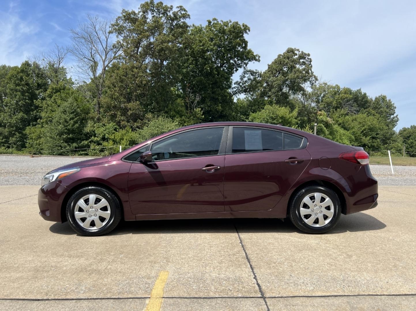 2018 BURGUNDY /Black Cloth Kia Forte LX (3KPFK4A75JE) with an 2.0L 4 Cyl. engine, Automatic transmission, located at 506 S. Kingshighway, Cape Girardeau, MO, 63703, (573) 235-5000, 37.294991, -89.553635 - 2018 Kia Forte LX 111xxx miles Front Wheel Drive 2.0L 4 Cyl. Automatic Backup Camera Bluetooth Cruise Power Windows/Locks/Mirrors We have financing available and we accept trades! Fill out a credit application on our website or come by today! If you have any questions, give us a call at (5 - Photo#4