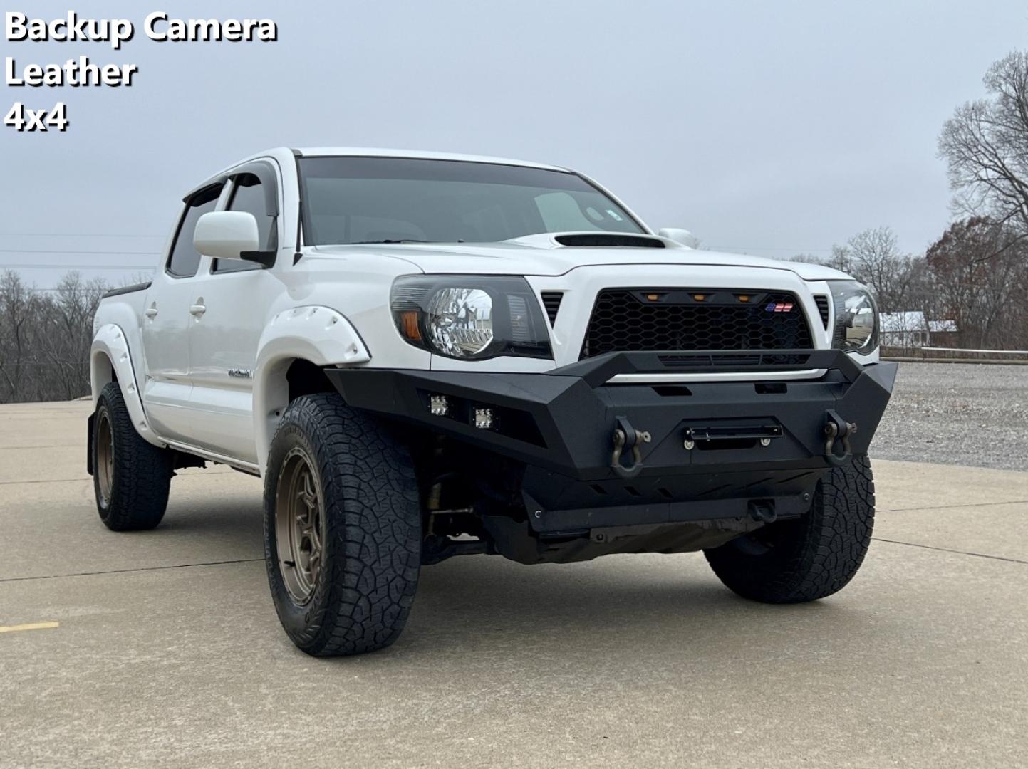 2006 WHITE /Gray Leather Toyota Tacoma TRD Sport Double Cab V6 4WD (5TELU42N96Z) with an 4.0L V6 engine, Automatic transmission, located at 2990 Old Orchard Rd., Jackson, MO, 63755, 37.354214, -89.612106 - 2006 Toyota Tacoma TRD Sport 207xxx miles 4x4 4.0L V6 Automatic Leather Backup Camera Bluetooth Cruise Power Windows/Locks/Mirrors We have financing available and we accept trades! Fill out a credit application on our website or come by today! If you have any questions, give us a call at - Photo#0