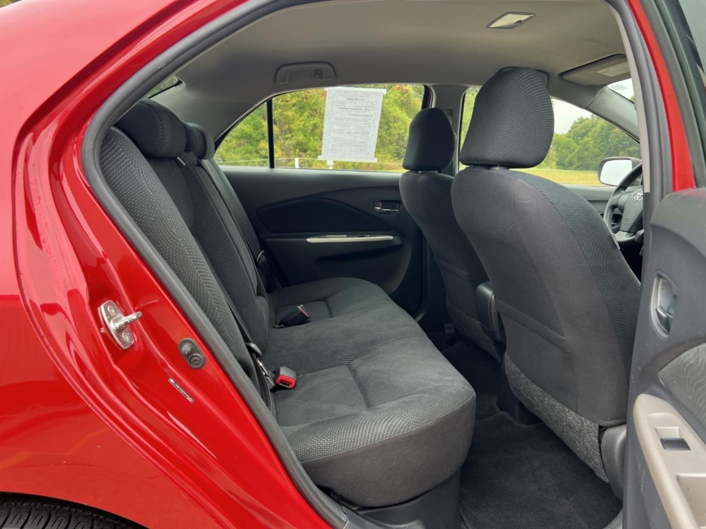 2009 RED /Black Cloth Toyota Yaris Sedan (JTDBT903091) with an 1.5L 4 Cyl. engine, Automatic transmission, located at 2990 Old Orchard Rd., Jackson, MO, 63755, 37.354214, -89.612106 - 2009 Toyota Yaris 185xxx miles Front Wheel Drive 1.5L 4 Cyl. Automatic Cruise Power Windows/Locks/Mirrors We have financing available and we accept trades! Fill out a credit application on our website or come by today! If you have any questions, give us a call at (573) 204-7777 or visit our - Photo#14