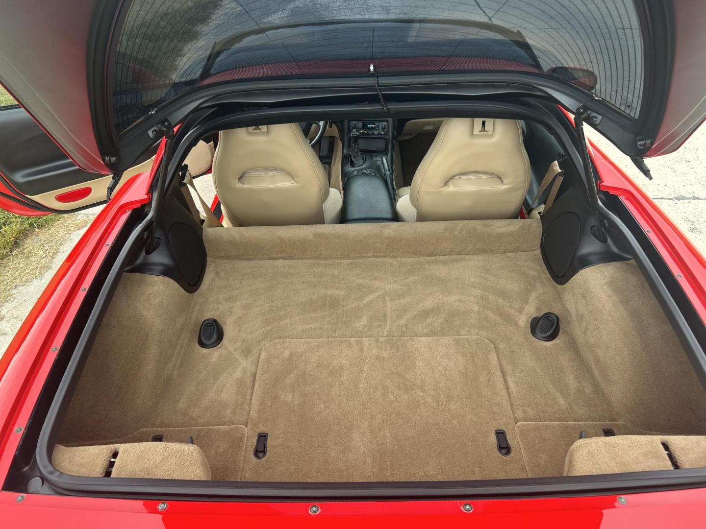 2000 TORCH RED /Tan Chevrolet Corvette Coupe (1G1YY22G3Y5) with an 5.7L V8 OHV 16V engine, Automatic transmission, located at 506 S. Kingshighway, Cape Girardeau, MO, 63703, (573) 235-5000, 37.294991, -89.553635 - 2000 Chevrolet Corvette 26xxx Miles Rear Wheel Drive 5.7L V8 LS1 Automatic Leather Selective Real-Time Damping Magnesium Wheels Targa Top Heads Up Display Bose Audio 6 Speaker System With CD Power/Heated Mirrors Power 6 Way Driver/Passenger Seats Power Locks/Windows Telescoping Steeri - Photo#12