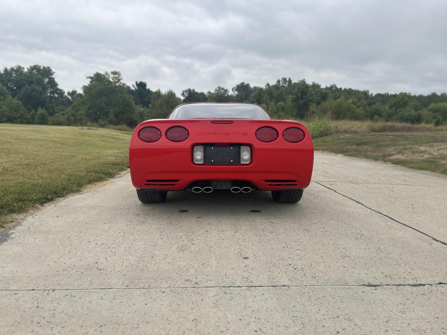 2000 TORCH RED /Tan Chevrolet Corvette Coupe (1G1YY22G3Y5) with an 5.7L V8 OHV 16V engine, Automatic transmission, located at 506 S. Kingshighway, Cape Girardeau, MO, 63703, (573) 235-5000, 37.294991, -89.553635 - 2000 Chevrolet Corvette 26xxx Miles Rear Wheel Drive 5.7L V8 LS1 Automatic Leather Selective Real-Time Damping Magnesium Wheels Targa Top Heads Up Display Bose Audio 6 Speaker System With CD Power/Heated Mirrors Power 6 Way Driver/Passenger Seats Power Locks/Windows Telescoping Steeri - Photo#7