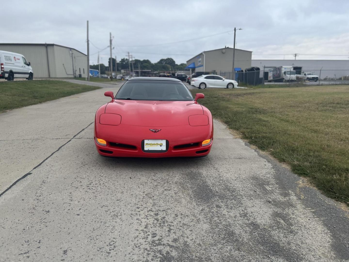 2000 TORCH RED /Tan Chevrolet Corvette Coupe (1G1YY22G3Y5) with an 5.7L V8 OHV 16V engine, Automatic transmission, located at 506 S. Kingshighway, Cape Girardeau, MO, 63703, (573) 235-5000, 37.294991, -89.553635 - 2000 Chevrolet Corvette 26xxx Miles Rear Wheel Drive 5.7L V8 LS1 Automatic Leather Selective Real-Time Damping Magnesium Wheels Targa Top Heads Up Display Bose Audio 6 Speaker System With CD Power/Heated Mirrors Power 6 Way Driver/Passenger Seats Power Locks/Windows Telescoping Steeri - Photo#8