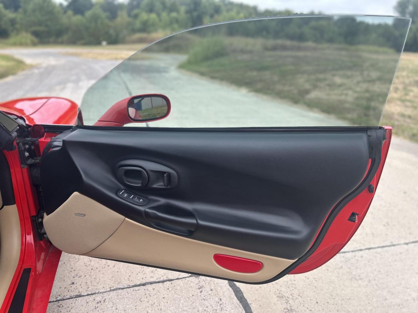 2000 TORCH RED /Tan Chevrolet Corvette Coupe (1G1YY22G3Y5) with an 5.7L V8 OHV 16V engine, Automatic transmission, located at 506 S. Kingshighway, Cape Girardeau, MO, 63703, (573) 235-5000, 37.294991, -89.553635 - 2000 Chevrolet Corvette 26xxx Miles Rear Wheel Drive 5.7L V8 LS1 Automatic Leather Selective Real-Time Damping Magnesium Wheels Targa Top Heads Up Display Bose Audio 6 Speaker System With CD Power/Heated Mirrors Power 6 Way Driver/Passenger Seats Power Locks/Windows Telescoping Steeri - Photo#17