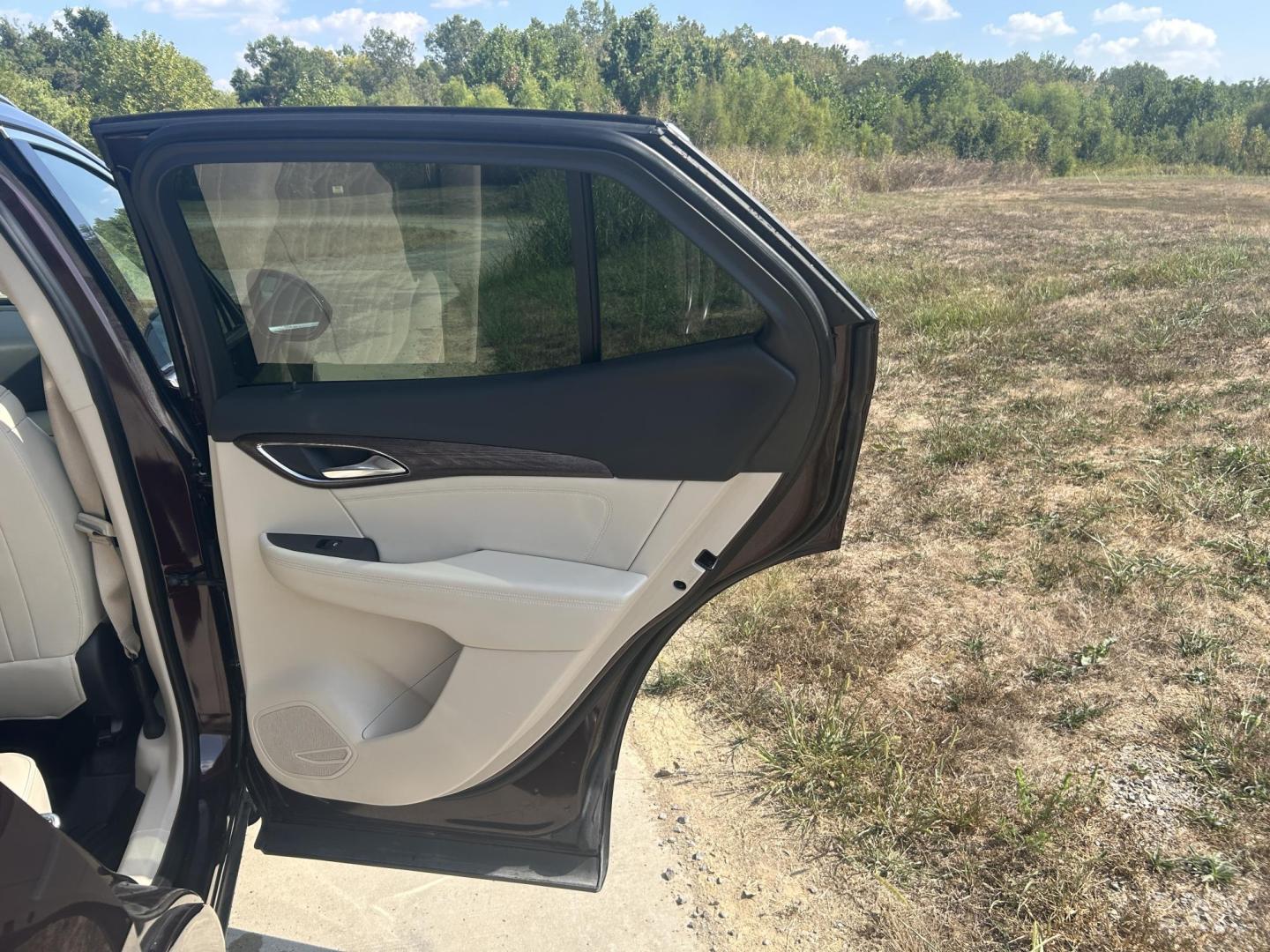 2021 BURGUNDY /TAN Buick Envision Avenir AWD (LRBFZSR42MD) with an 2.0L L4 DOHC 24V TURBO engine, Automatic transmission, located at 506 S. Kingshighway, Cape Girardeau, MO, 63703, (573) 235-5000, 37.294991, -89.553635 - 2021 BUICK ENVISION 48xxx miles All Wheel Drive 2.0L V4 Automatic Leather Heads Up Display Navigation Dual Climate Control Power/Heated/Cooled Seats Heated Rear Seats Backup Camera Panoramic Sunroof/Moonroof Bluetooth Remote Start Power Hatchback Adaptive Cruise Power Windows/Locks/ - Photo#22