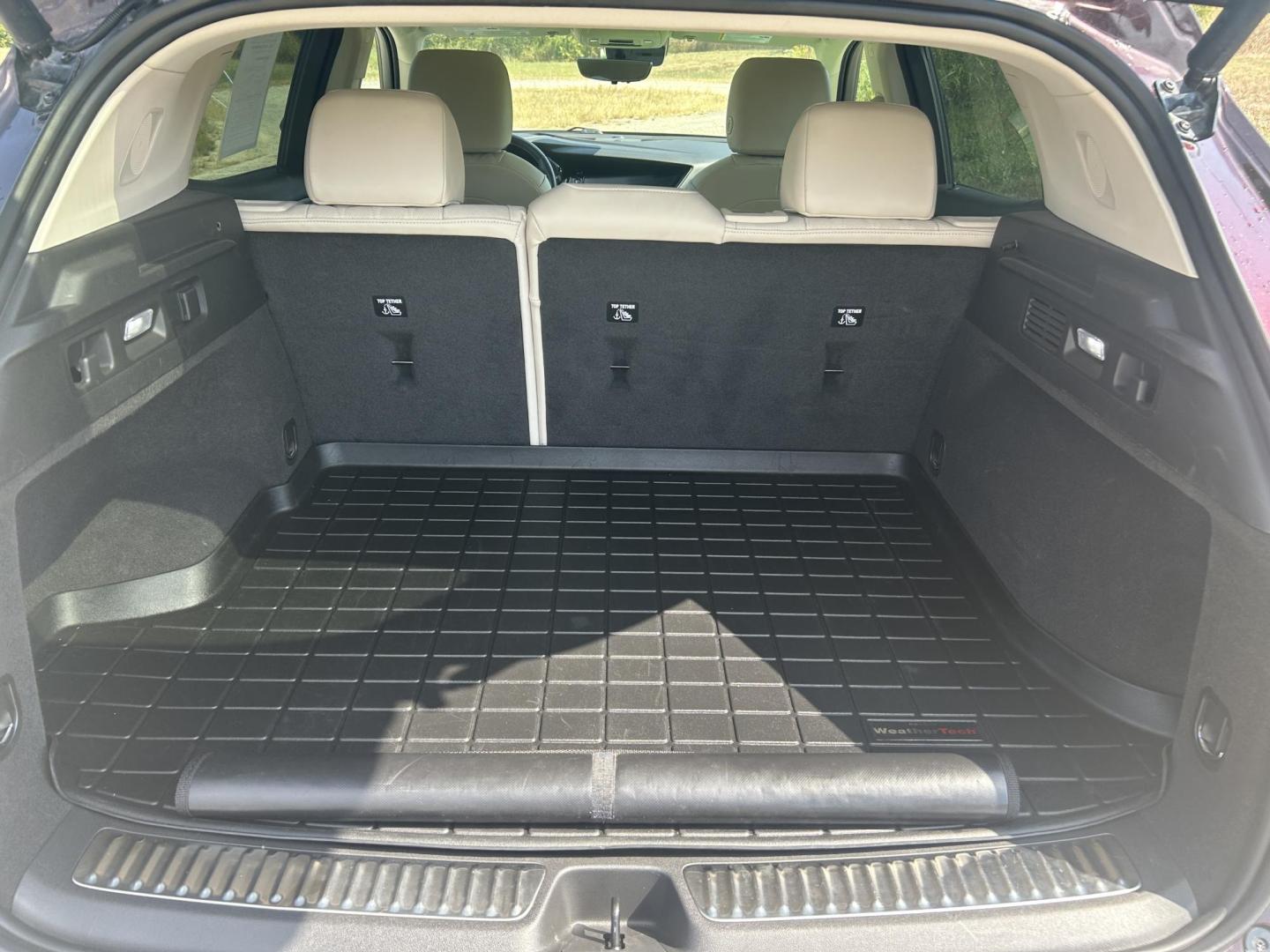 2021 BURGUNDY /TAN Buick Envision Avenir AWD (LRBFZSR42MD) with an 2.0L L4 DOHC 24V TURBO engine, Automatic transmission, located at 506 S. Kingshighway, Cape Girardeau, MO, 63703, (573) 235-5000, 37.294991, -89.553635 - 2021 BUICK ENVISION 48xxx miles All Wheel Drive 2.0L V4 Automatic Leather Heads Up Display Navigation Dual Climate Control Power/Heated/Cooled Seats Heated Rear Seats Backup Camera Panoramic Sunroof/Moonroof Bluetooth Remote Start Power Hatchback Adaptive Cruise Power Windows/Locks/ - Photo#11