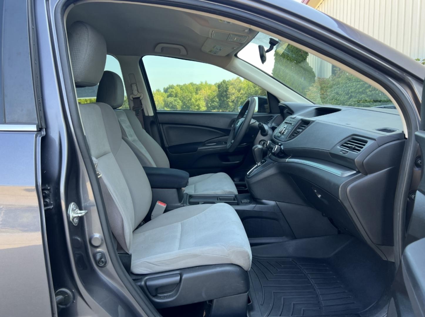 2015 GRAY /Gray Cloth Honda CR-V LX 2WD (3CZRM3H38FG) with an 2.4L 4 Cyl. engine, Continuously Variable Transmission transmission, located at 506 S. Kingshighway, Cape Girardeau, MO, 63703, (573) 235-5000, 37.294991, -89.553635 - 2015 Honda CR-V LX 146xxx miles Front Wheel Drive 2.4L 4 Cyl. Automatic Backup Camera Bluetooth Cruise Power Windows/Locks/Mirrors We have financing available and we accept trades! Fill out a credit application on our website or come by today! If you have any questions, give us a call at ( - Photo#13