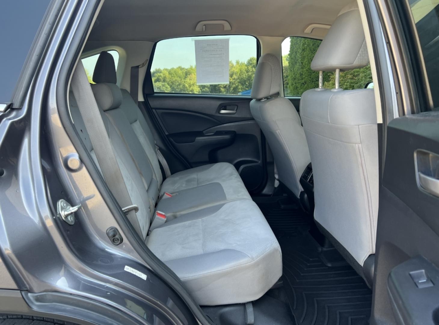 2015 GRAY /Gray Cloth Honda CR-V LX 2WD (3CZRM3H38FG) with an 2.4L 4 Cyl. engine, Continuously Variable Transmission transmission, located at 506 S. Kingshighway, Cape Girardeau, MO, 63703, (573) 235-5000, 37.294991, -89.553635 - 2015 Honda CR-V LX 146xxx miles Front Wheel Drive 2.4L 4 Cyl. Automatic Backup Camera Bluetooth Cruise Power Windows/Locks/Mirrors We have financing available and we accept trades! Fill out a credit application on our website or come by today! If you have any questions, give us a call at ( - Photo#15
