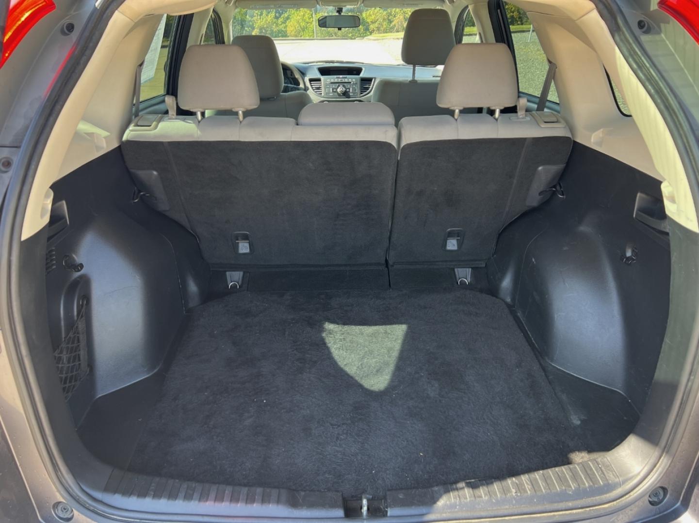 2015 GRAY /Gray Cloth Honda CR-V LX 2WD (3CZRM3H38FG) with an 2.4L 4 Cyl. engine, Continuously Variable Transmission transmission, located at 506 S. Kingshighway, Cape Girardeau, MO, 63703, (573) 235-5000, 37.294991, -89.553635 - 2015 Honda CR-V LX 146xxx miles Front Wheel Drive 2.4L 4 Cyl. Automatic Backup Camera Bluetooth Cruise Power Windows/Locks/Mirrors We have financing available and we accept trades! Fill out a credit application on our website or come by today! If you have any questions, give us a call at ( - Photo#17