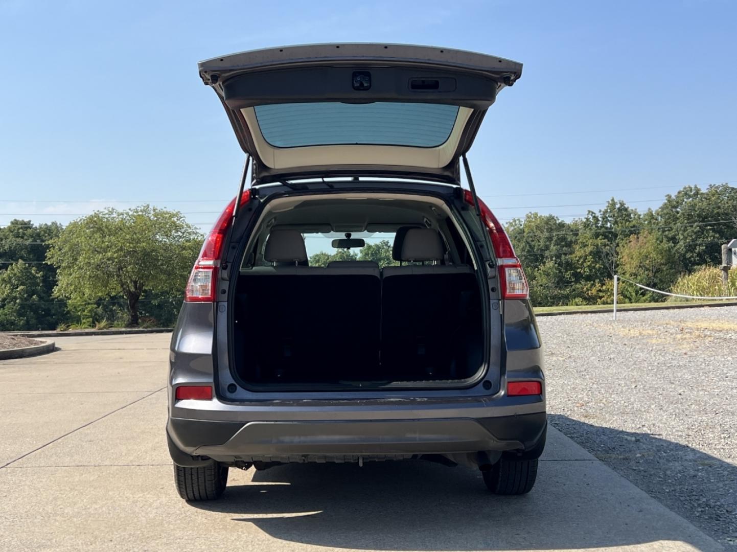 2015 GRAY /Gray Cloth Honda CR-V LX 2WD (3CZRM3H38FG) with an 2.4L 4 Cyl. engine, Continuously Variable Transmission transmission, located at 506 S. Kingshighway, Cape Girardeau, MO, 63703, (573) 235-5000, 37.294991, -89.553635 - 2015 Honda CR-V LX 146xxx miles Front Wheel Drive 2.4L 4 Cyl. Automatic Backup Camera Bluetooth Cruise Power Windows/Locks/Mirrors We have financing available and we accept trades! Fill out a credit application on our website or come by today! If you have any questions, give us a call at ( - Photo#16