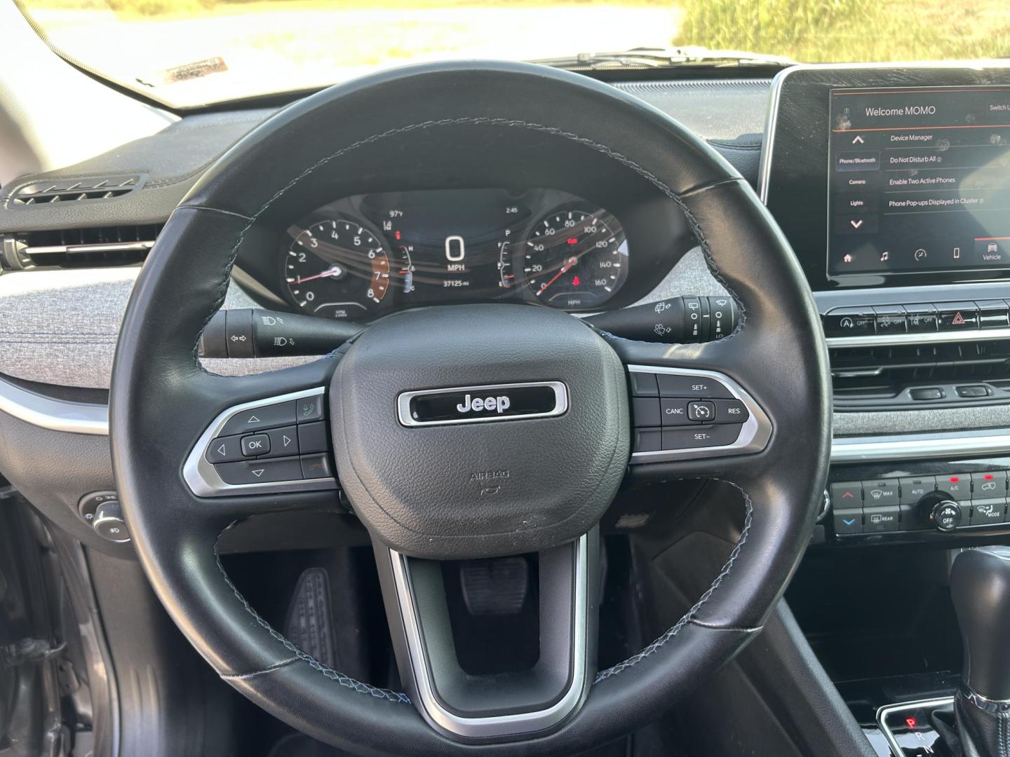 2022 GRAY /Black Jeep Compass Latitude 4WD (3C4NJDBB5NT) with an 2.4L L4 DOHC 16V engine, Automatic transmission, located at 506 S. Kingshighway, Cape Girardeau, MO, 63703, (573) 235-5000, 37.294991, -89.553635 - 2022 Jeep Compass Latitude 4WD 37xxx miles Four Wheel Drive 2.4L 4 Cyl. Automatic Backup Camera Bluetooth Power Driver Seat Heated Seats Cruise Power Lift Gate Power Windows/Locks/Mirrors We have financing available and we accept trades! Fill out a credit application on our website or co - Photo#26