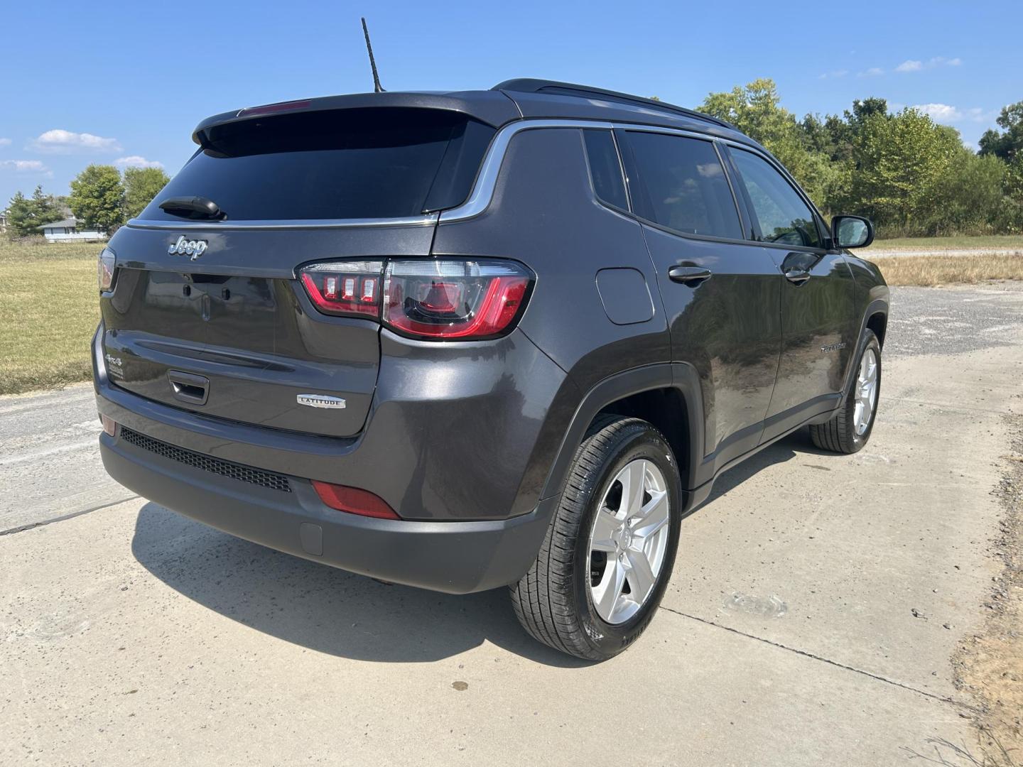 2022 GRAY /Black Jeep Compass Latitude 4WD (3C4NJDBB5NT) with an 2.4L L4 DOHC 16V engine, Automatic transmission, located at 506 S. Kingshighway, Cape Girardeau, MO, 63703, (573) 235-5000, 37.294991, -89.553635 - 2022 Jeep Compass Latitude 4WD 37xxx miles Four Wheel Drive 2.4L 4 Cyl. Automatic Backup Camera Bluetooth Power Driver Seat Heated Seats Cruise Power Lift Gate Power Windows/Locks/Mirrors We have financing available and we accept trades! Fill out a credit application on our website or co - Photo#12
