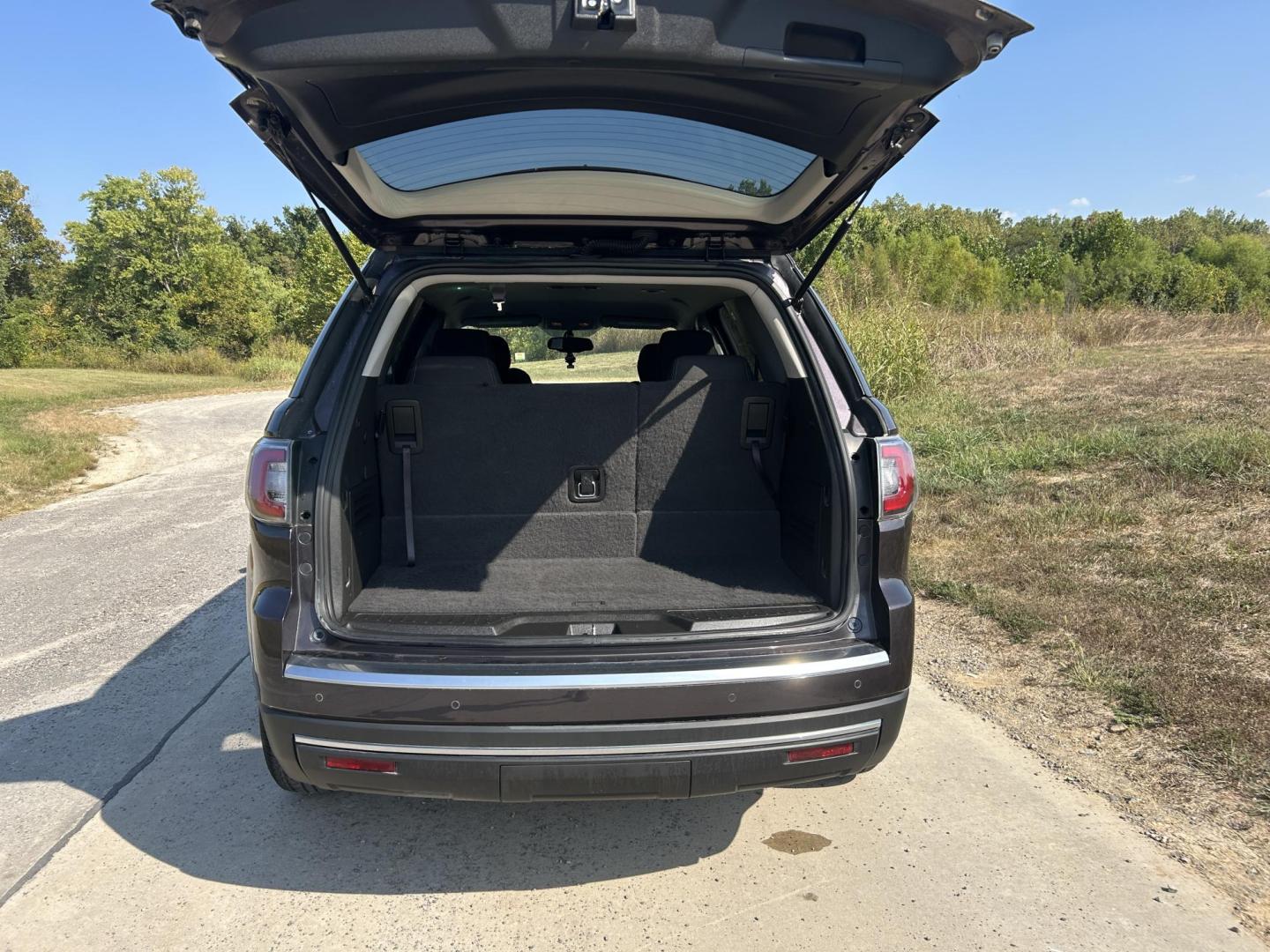 2015 BURGUNDY /Black GMC Acadia SLE-1 FWD (1GKKRNED1FJ) with an 3.6L V6 DOHC 24V engine, 6-Speed Automatic transmission, located at 506 S. Kingshighway, Cape Girardeau, MO, 63703, (573) 235-5000, 37.294991, -89.553635 - ***Salvage Title*** 2015 GMC Acadia SLE 120,XXX Miles 3.6L V6 Automatic Front Wheel Drive Back Up Camera Third Row Bluetooth Cruise Power Locks/Windows/Mirrors We have financing available and we accept trades! Fill out a credit application on our website or come by today! If you have any - Photo#11