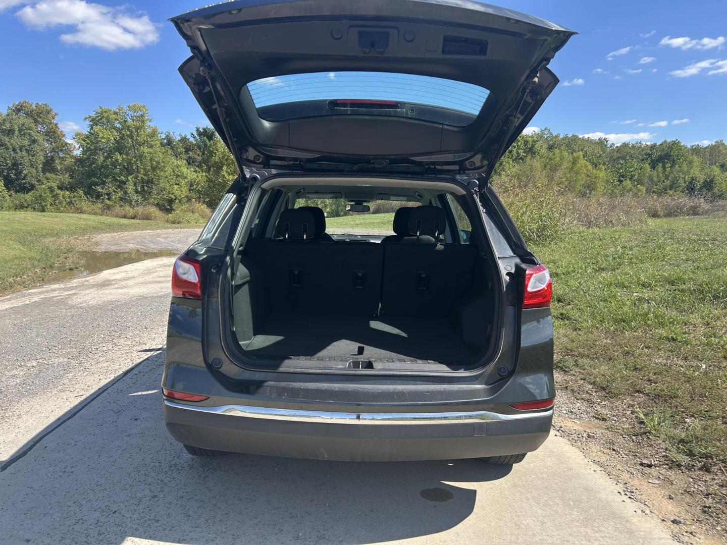 2018 GRAY /Black Chevrolet Equinox LS 2WD (2GNAXHEV7J6) with an 1.5L L4 DIR DOHC 16V TURBO engine, 6A transmission, located at 506 S. Kingshighway, Cape Girardeau, MO, 63703, (573) 235-5000, 37.294991, -89.553635 - 2018 Chevrolet Equinox LS 142xxx miles Front Wheel Drive 1.5L 4 Cyl. Automatic Backup Camera Power Driver Seat Bluetooth Cruise Power Windows/Locks/Mirrors We have financing available and we accept trades! Fill out a credit application on our website or come by today! If you have any ques - Photo#36