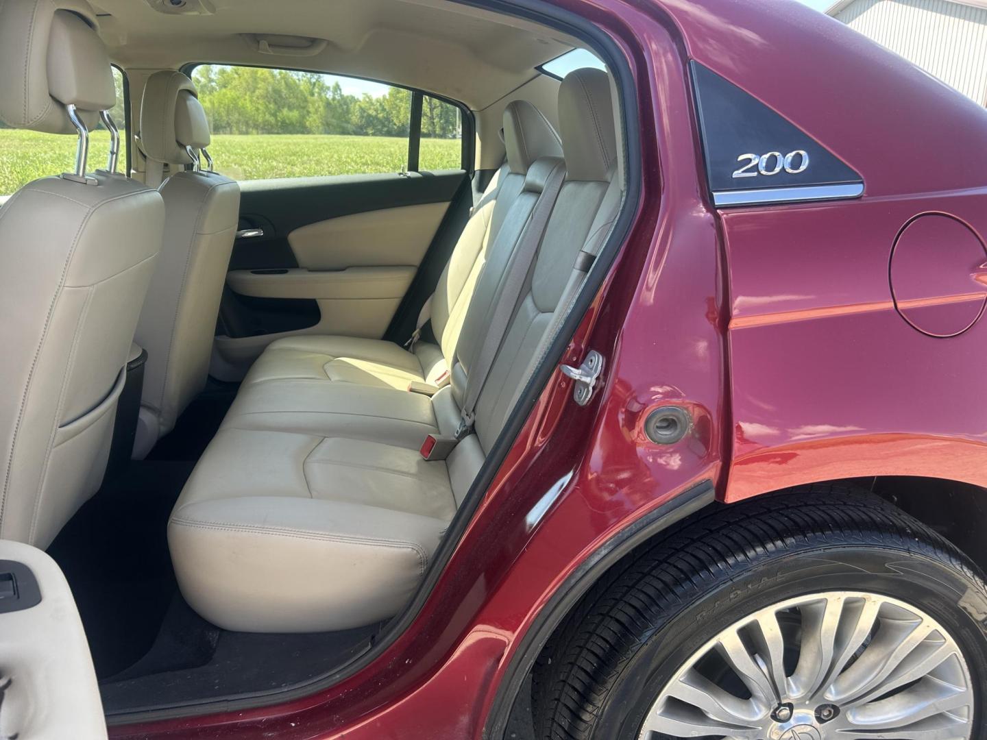 2011 MAROON /Tan Chrysler 200 Limited (1C3BC2FGXBN) with an 3.6L V6 DOHC 24V engine, 6-Speed Automatic transmission, located at 506 S. Kingshighway, Cape Girardeau, MO, 63703, (573) 235-5000, 37.294991, -89.553635 - 2011 Chrysler 200 Limited 77xxx miles Front Wheel Drive 3.6L 6 Cyl. Automatic Cruise Heated Seats Power Driver Seat Power Sunroof Leather Navigation Power Windows/Locks/Mirrors We have financing available and we accept trades! Fill out a credit application on our website or come by today - Photo#16
