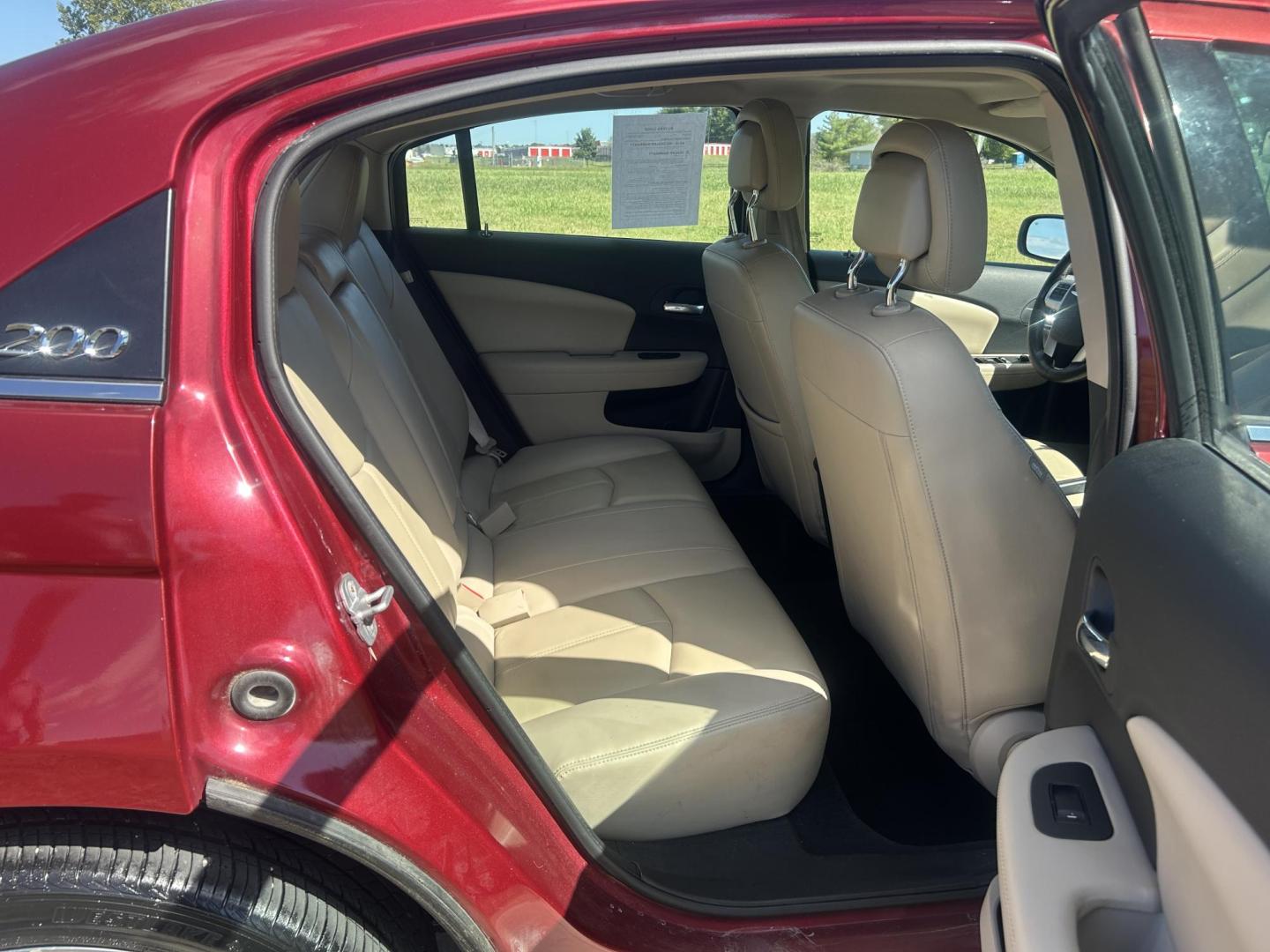 2011 MAROON /Tan Chrysler 200 Limited (1C3BC2FGXBN) with an 3.6L V6 DOHC 24V engine, 6-Speed Automatic transmission, located at 506 S. Kingshighway, Cape Girardeau, MO, 63703, (573) 235-5000, 37.294991, -89.553635 - 2011 Chrysler 200 Limited 77xxx miles Front Wheel Drive 3.6L 6 Cyl. Automatic Cruise Heated Seats Power Driver Seat Power Sunroof Leather Navigation Power Windows/Locks/Mirrors We have financing available and we accept trades! Fill out a credit application on our website or come by today - Photo#20