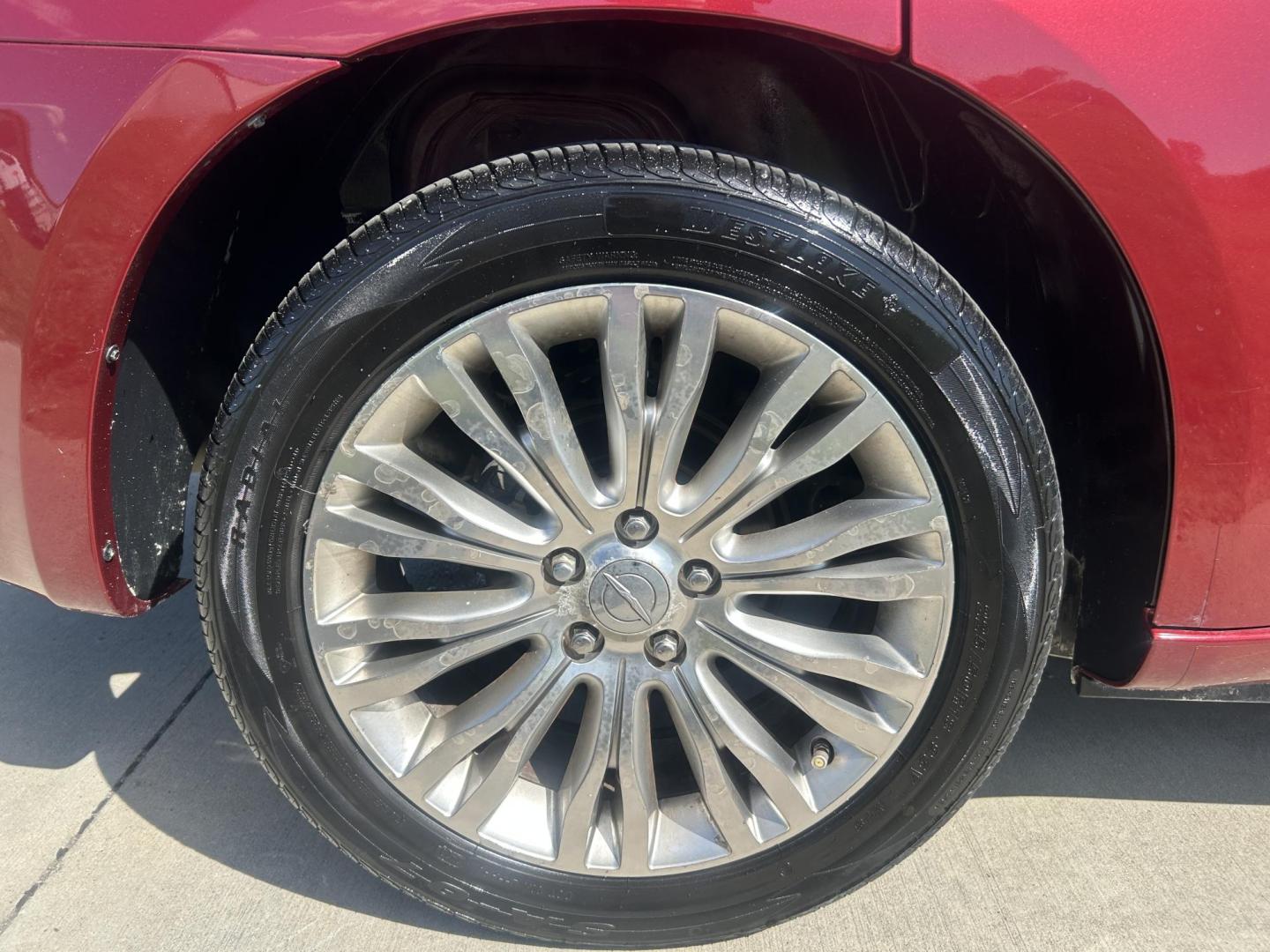2011 MAROON /Tan Chrysler 200 Limited (1C3BC2FGXBN) with an 3.6L V6 DOHC 24V engine, 6-Speed Automatic transmission, located at 506 S. Kingshighway, Cape Girardeau, MO, 63703, (573) 235-5000, 37.294991, -89.553635 - 2011 Chrysler 200 Limited 77xxx miles Front Wheel Drive 3.6L 6 Cyl. Automatic Cruise Heated Seats Power Driver Seat Power Sunroof Leather Navigation Power Windows/Locks/Mirrors We have financing available and we accept trades! Fill out a credit application on our website or come by today - Photo#34