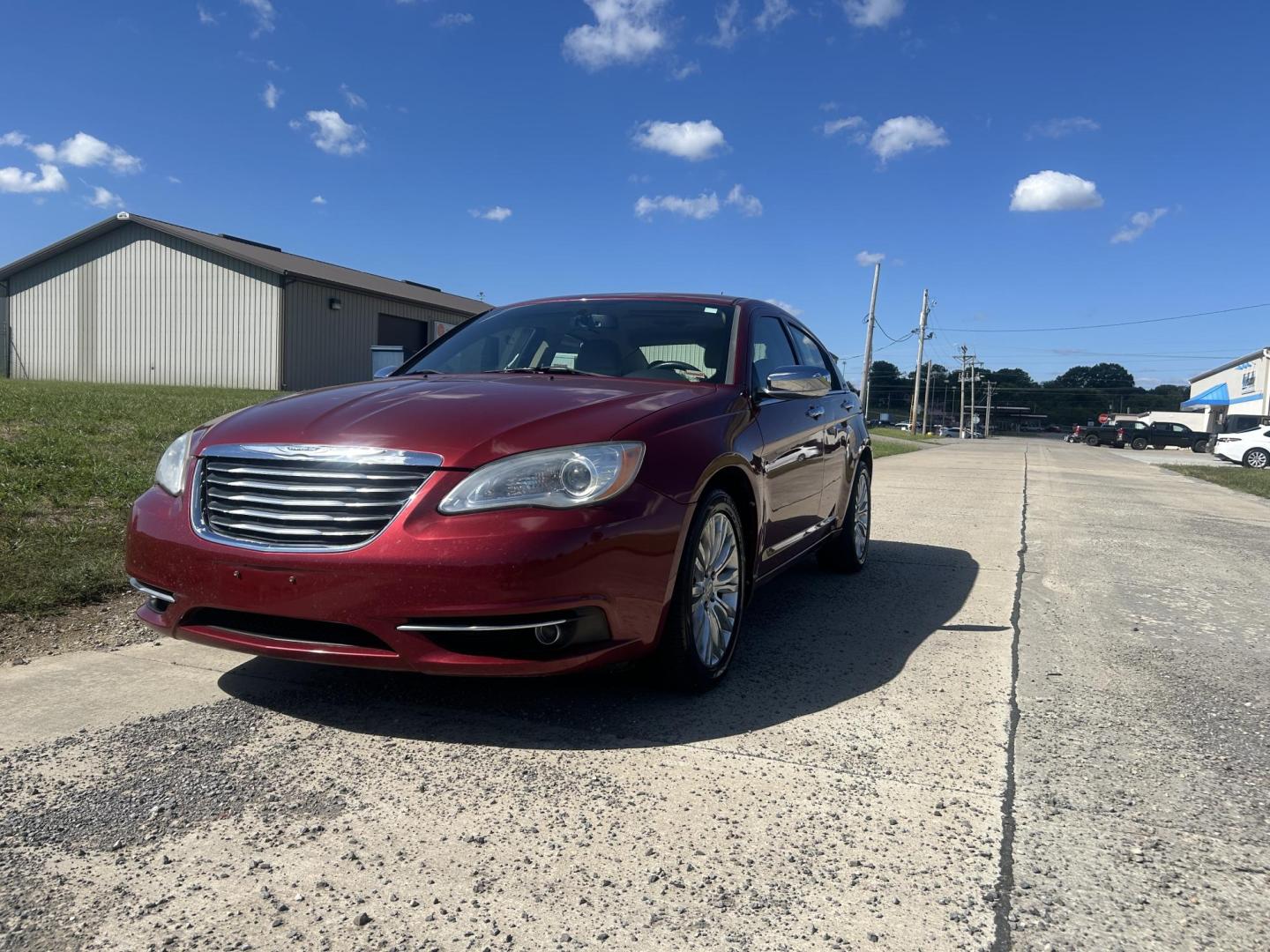 2011 MAROON /Tan Chrysler 200 Limited (1C3BC2FGXBN) with an 3.6L V6 DOHC 24V engine, 6-Speed Automatic transmission, located at 506 S. Kingshighway, Cape Girardeau, MO, 63703, (573) 235-5000, 37.294991, -89.553635 - 2011 Chrysler 200 Limited 77xxx miles Front Wheel Drive 3.6L 6 Cyl. Automatic Cruise Heated Seats Power Driver Seat Power Sunroof Leather Navigation Power Windows/Locks/Mirrors We have financing available and we accept trades! Fill out a credit application on our website or come by today - Photo#5